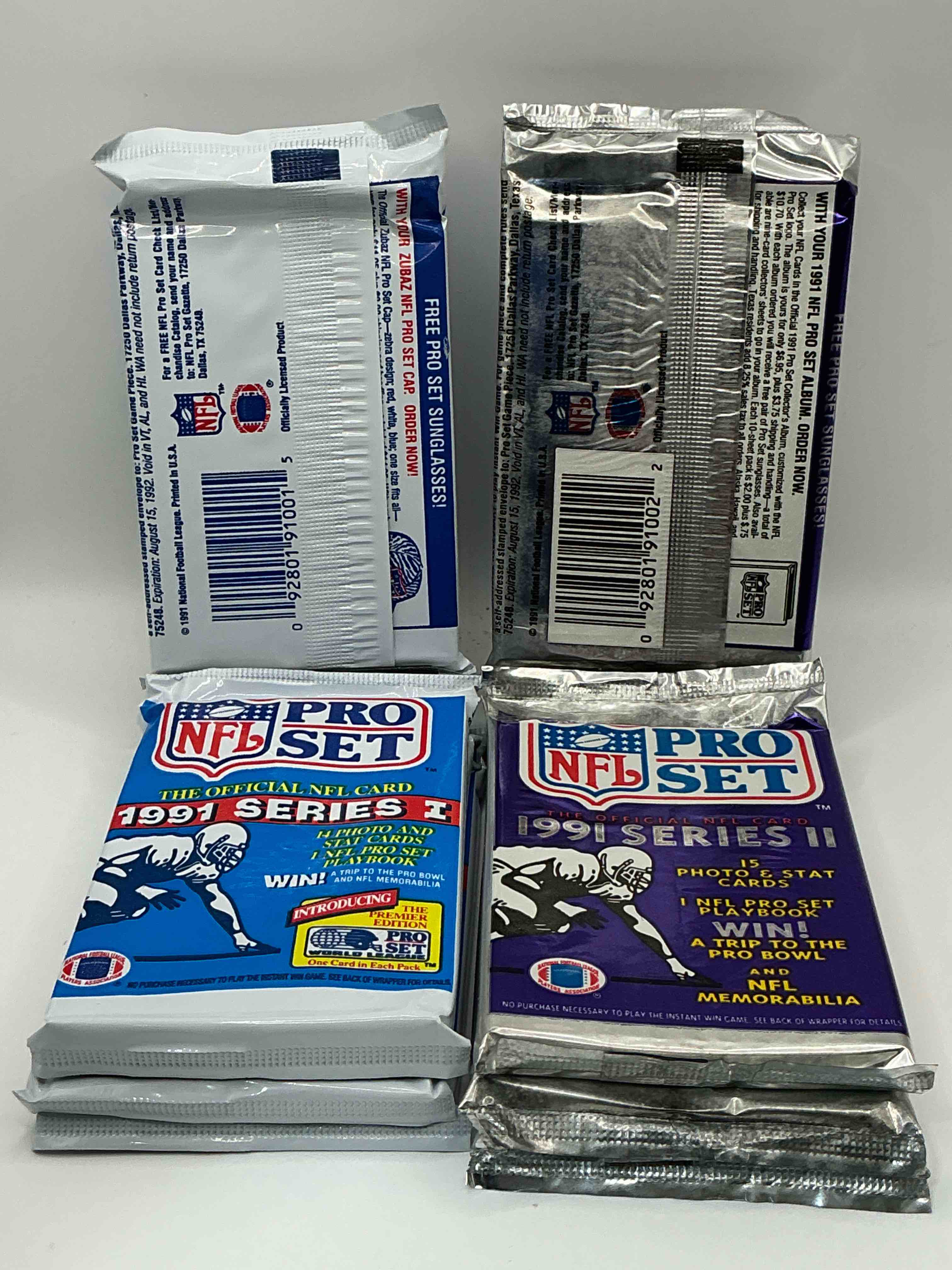 Condition photo showing New/Like New for 1991 Pro Set Platinum Edition Series I & II Unopened Packs! Search For Brett Favre Rookie & Bill Belichick Coach Rookie Card As Well As Santa Claus Card!
