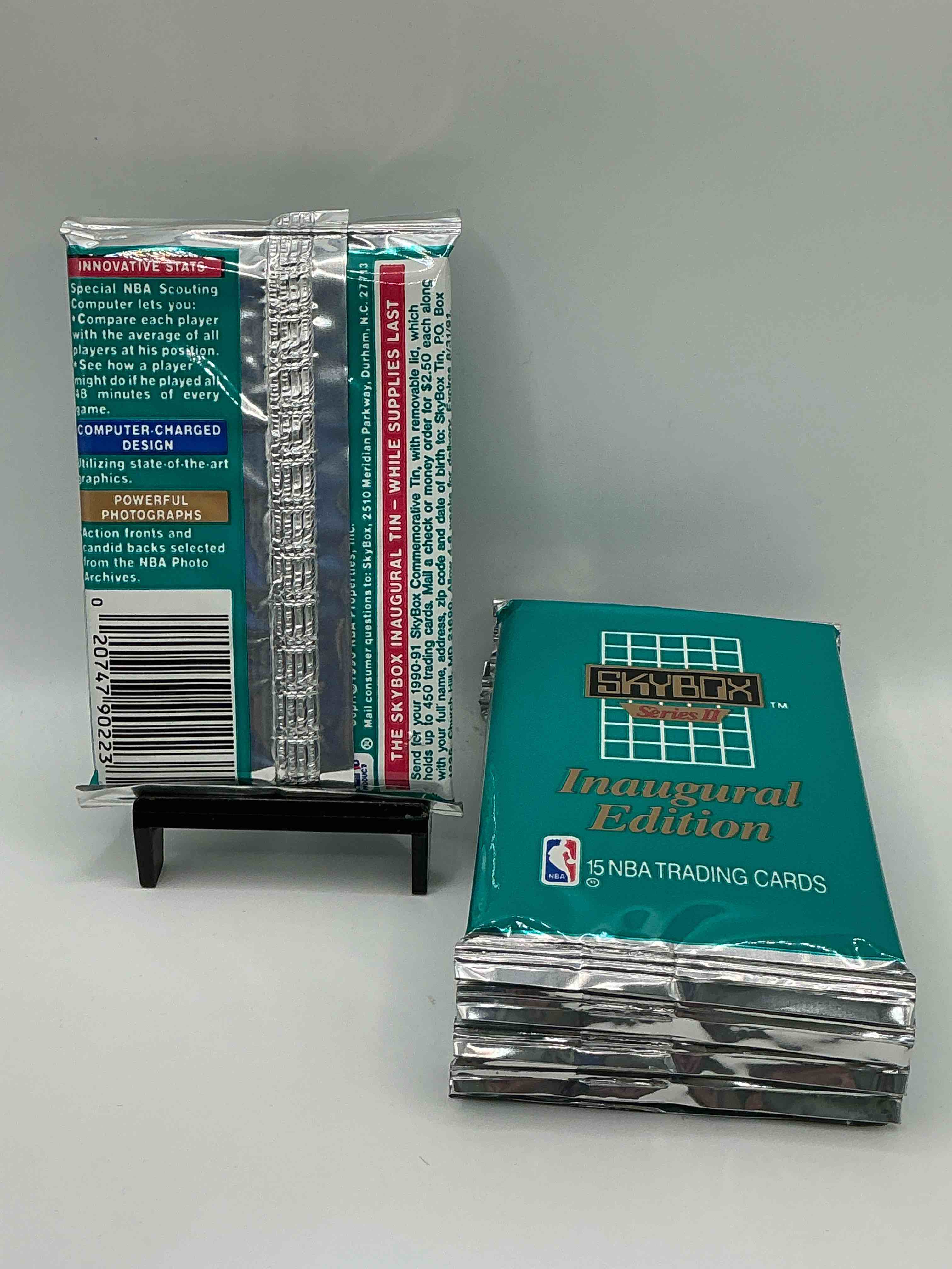 Condition photo showing New/Like New for Michael Jordan, Magic Johnson & More! Search For So Many NBA Legends & Stars! 1990-91 Skybox Unopened Packs, Series II! Direct From Original Box! These Packs Are Sought After For Ther Eye-Catching Teal Look & Awesome Cards! Search For Valuable Michael Jordan, Larry Bird & Magic Johnson Cards! Along With Other Stars!