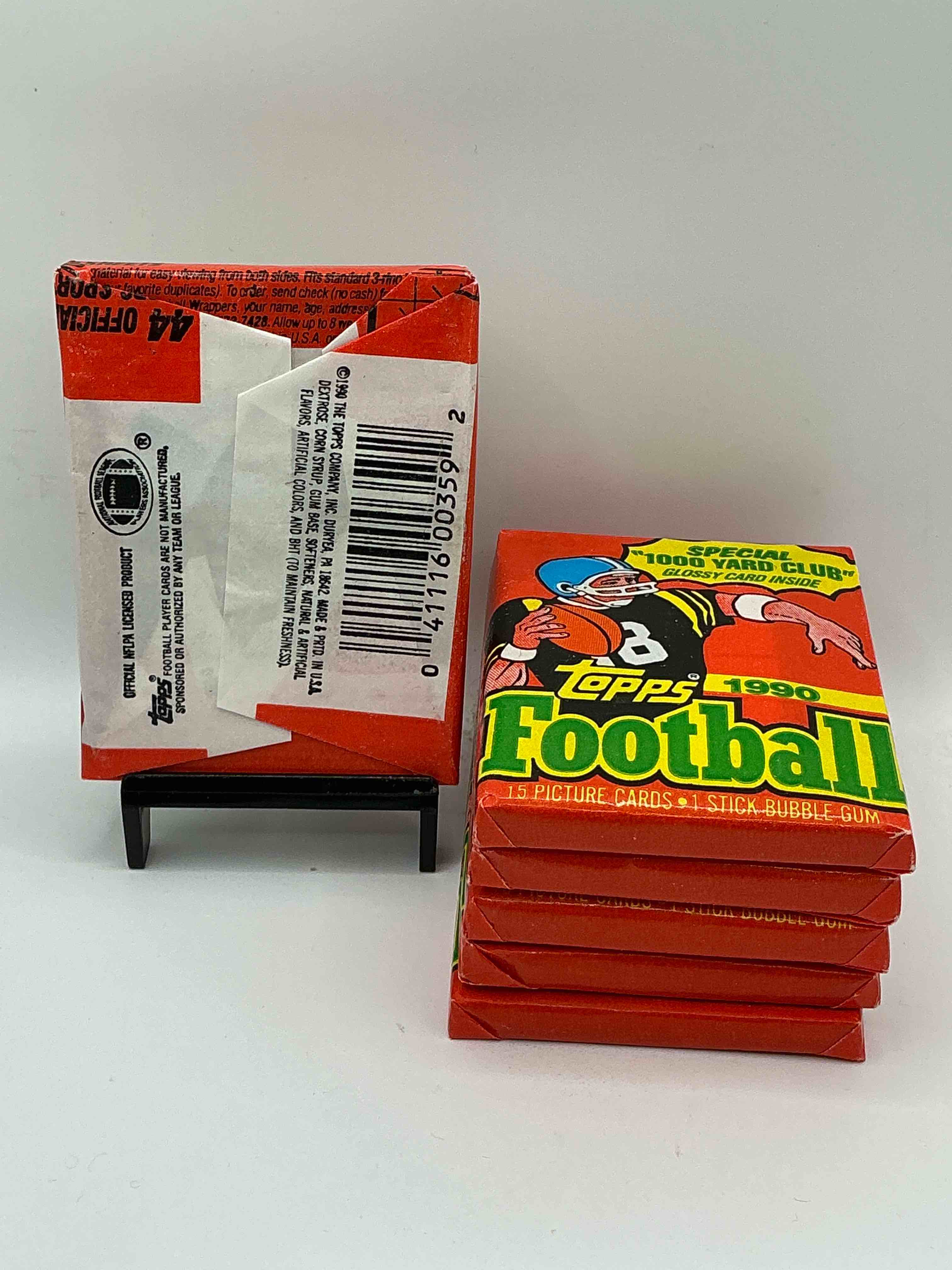 Condition photo showing New/Like New for The Last Year Of Football Wax! Joe Montana, Emmitt Smith & Barry Sanders!? 1990 Topps Football Unopened Sports Card Wax Pack, Direct From Original Retail Box! Getting Hard To Find! Search For Early Barry Sanders & Jerry Rice & So Much More!
