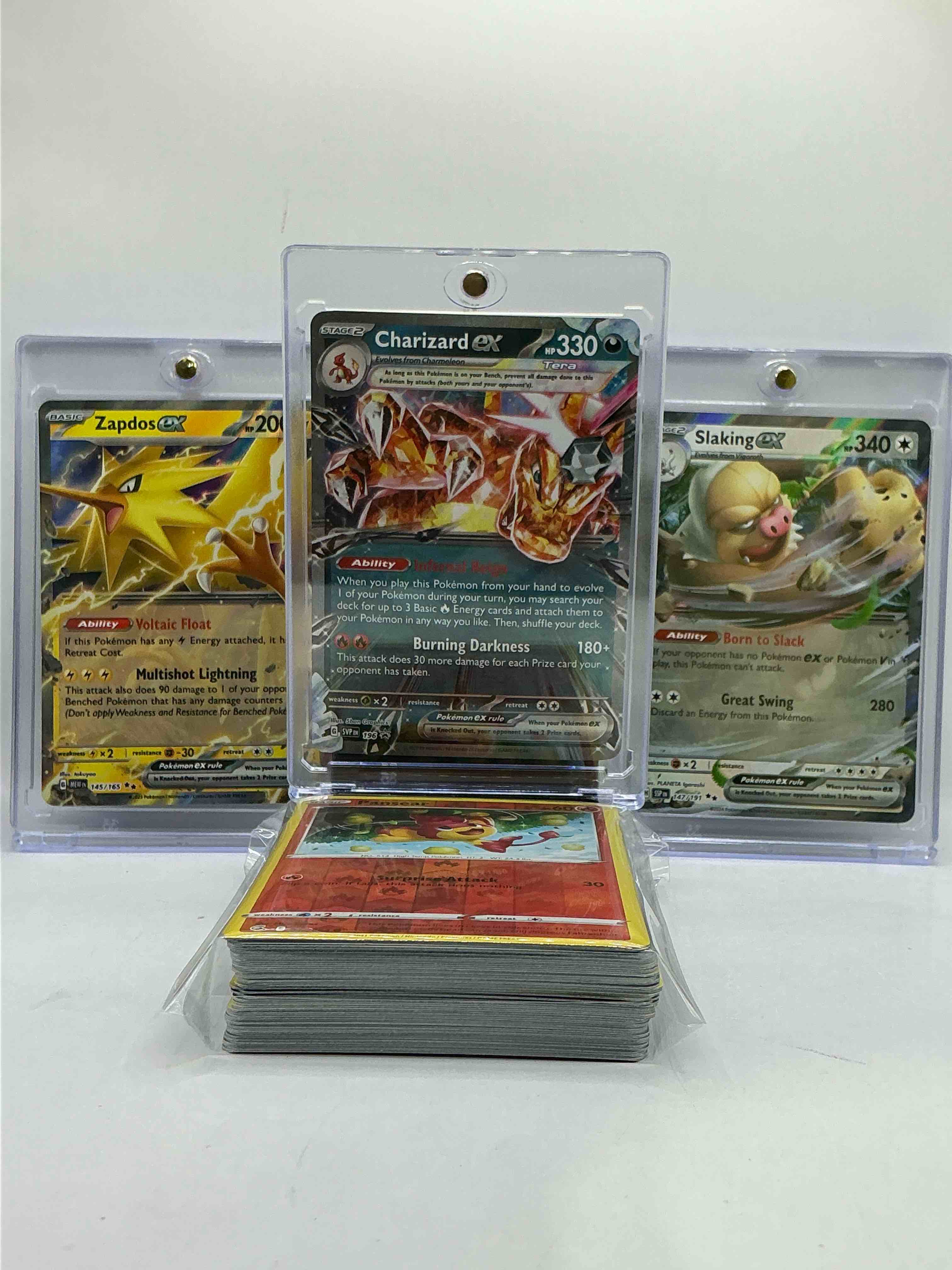 Condition photo showing New/Like New for Charizard EX, Slaking EX, Zapdos & More! WOW! Pokémon Party! Join The Fast Growing Hobby! This 50 Card Lot Includes Commons, Legends & More!