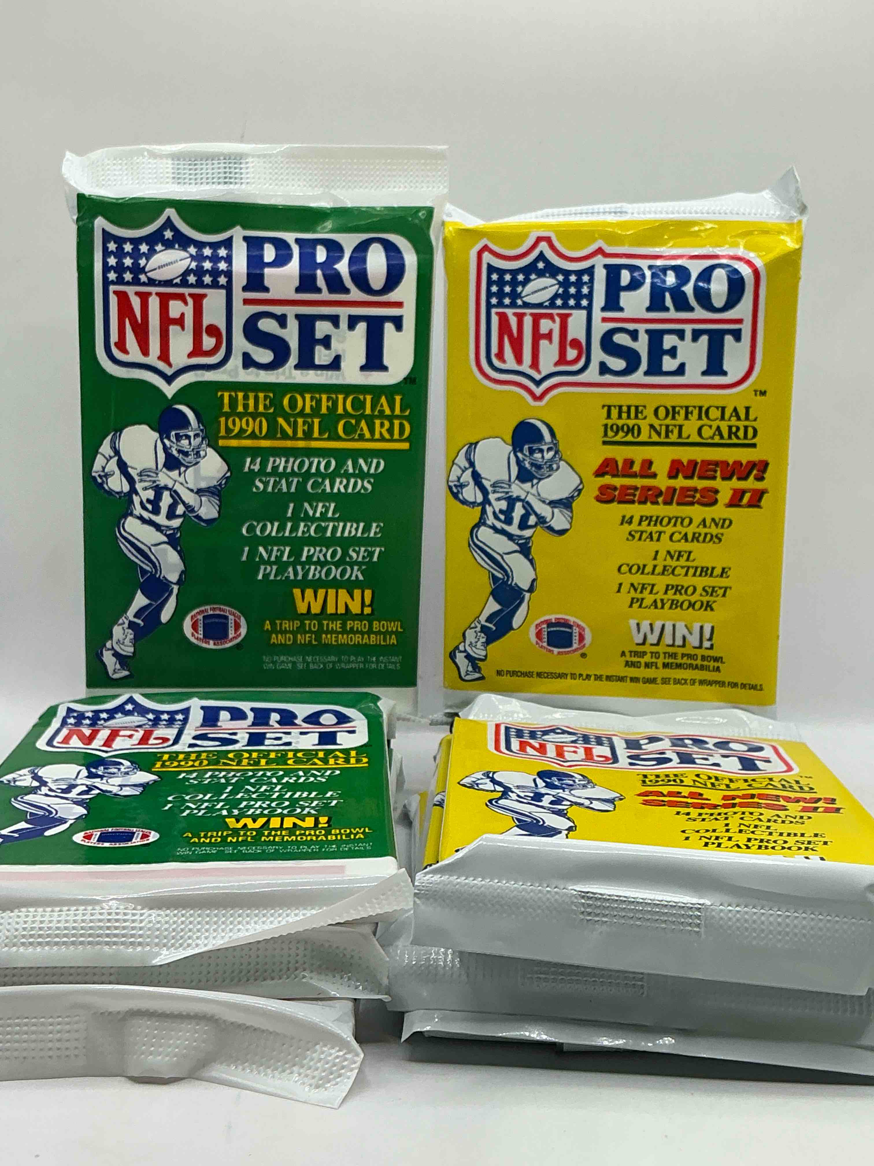 Condition photo showing New/Like New for Wow! 1990 Pro Set Football Sealed Card Pack, Direct From Original Retail Case!Highly Sought After By Collectors As This Year Is Loaded With High Profile Cards!Search For Cards From Barry Sanders, Deion Sanders, Troy Aikman, Michael Irvin & Much More! Getting Hard To Find!
