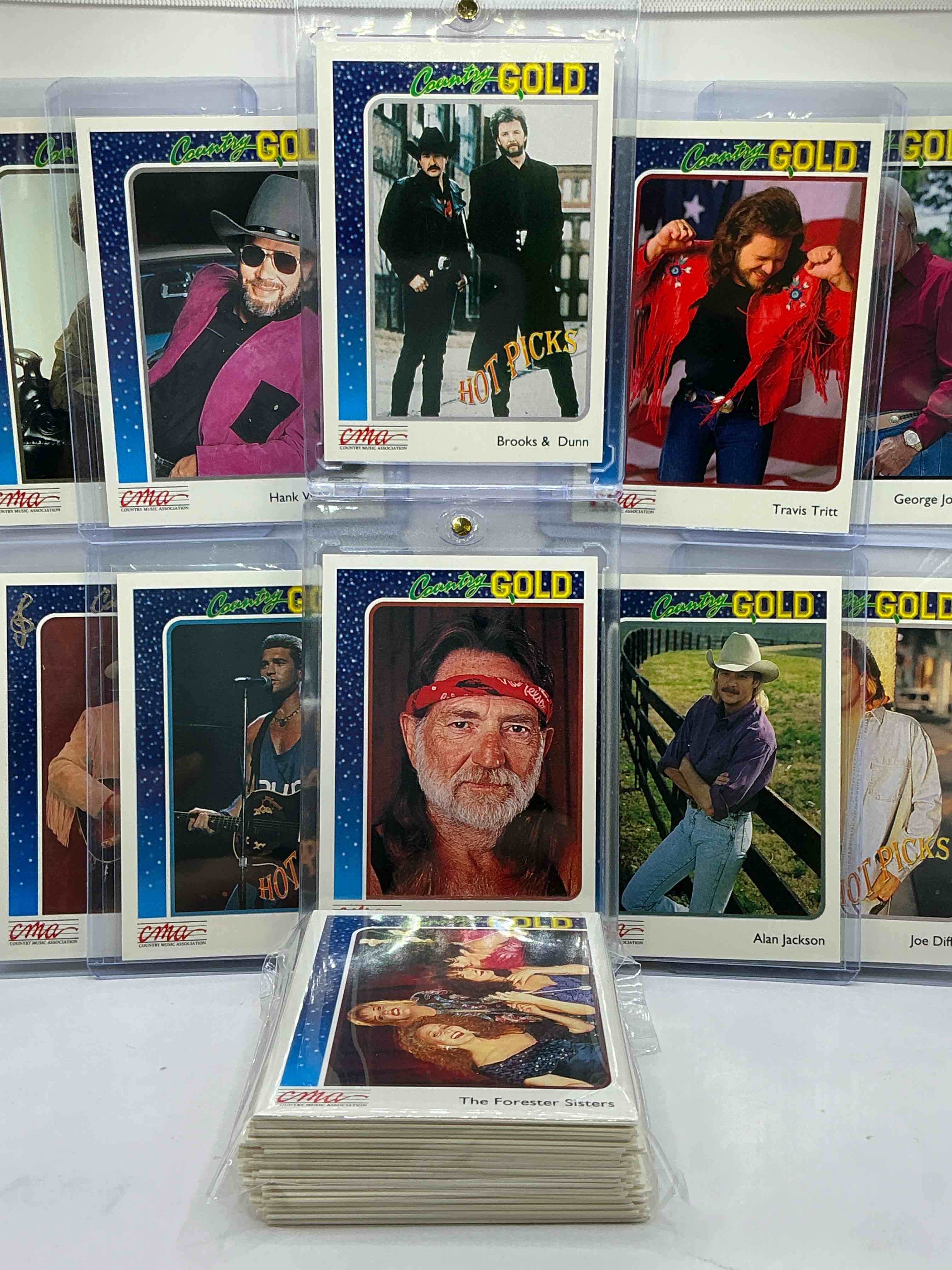 Condition photo showing New/Like New for Willie Nelson, Alan Jackson, Brooks & Dunn, Joe Diffe, Bill Ray Cyrus, Hank Williams Jr, George Jones, Randy Travis & More! 1992 CMA Country Music Cards! WOW! This 50 Card Lot Includes Commons & Country Music Legends!