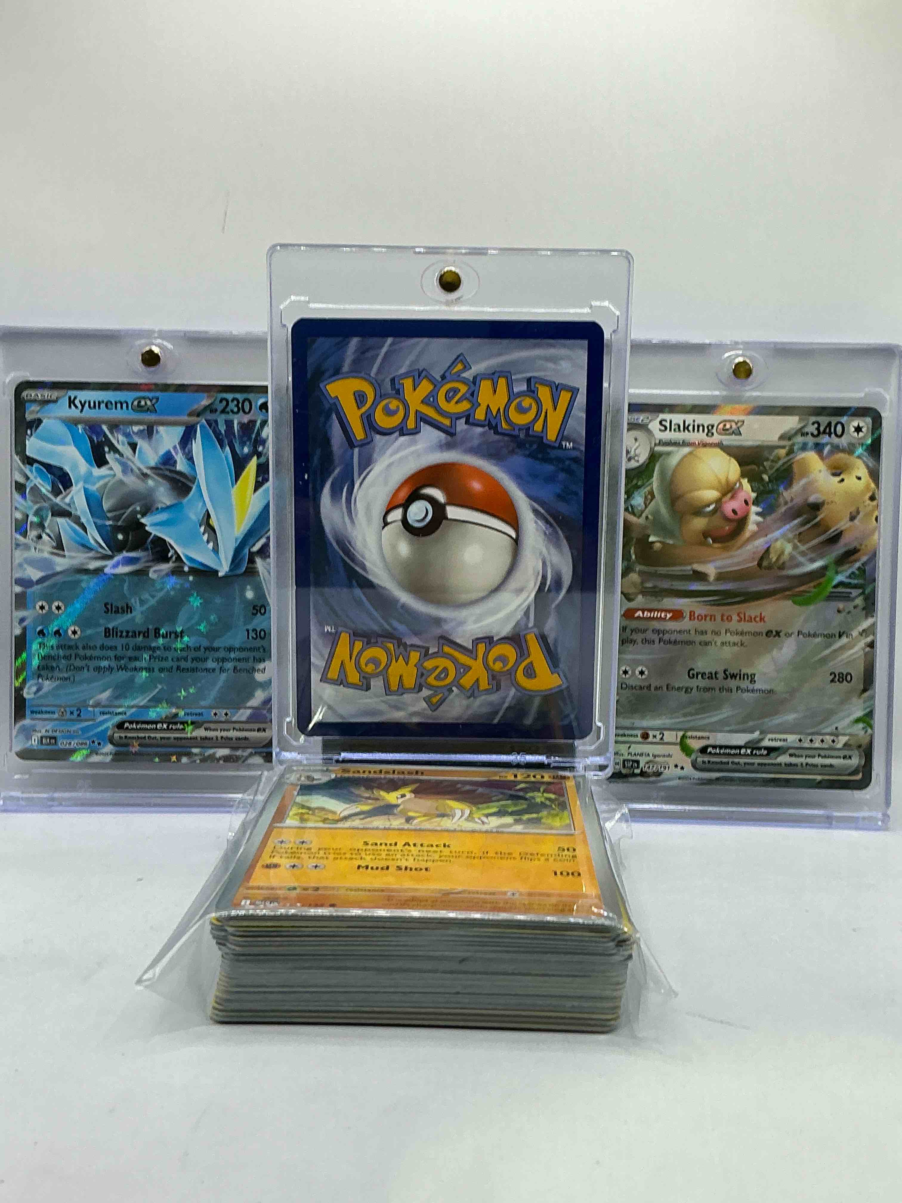 Condition photo showing New/Like New for Charizard EX, Kyurem EX, Slaking EX & More! Insane Trio! This 50 Card Lot Includes Commons, Legends, Pokémon & More! Awesome!