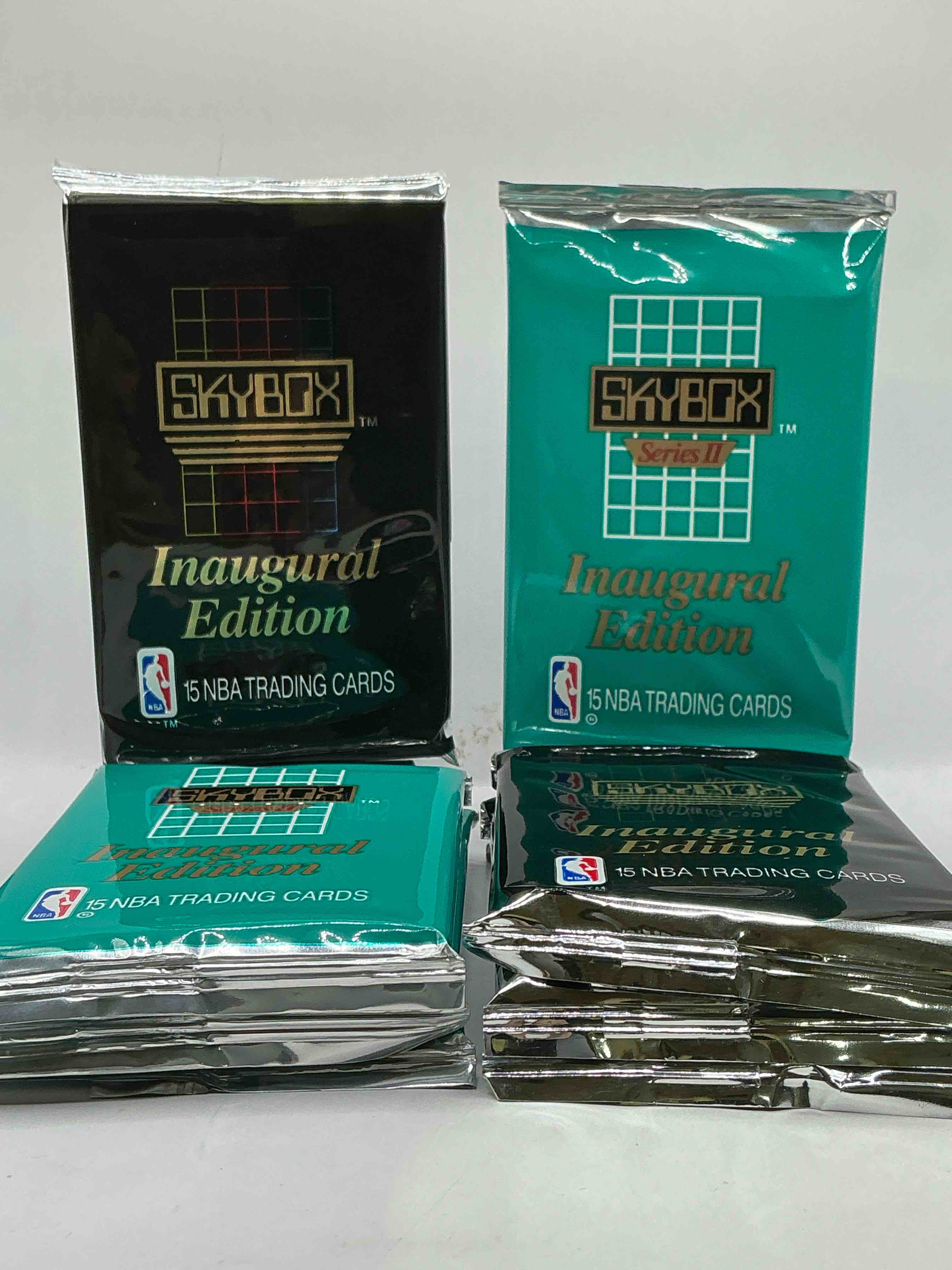 michael jordan, magic johnson & more! search for so many nba legends & stars! 1990-91 skybox unopened packs, series i! direct from original box! these packs are sought after for ther eye-catching teal look & awesome cards! search for valuable michael jordan, larry bird & magic johnson cards! along with other stars!