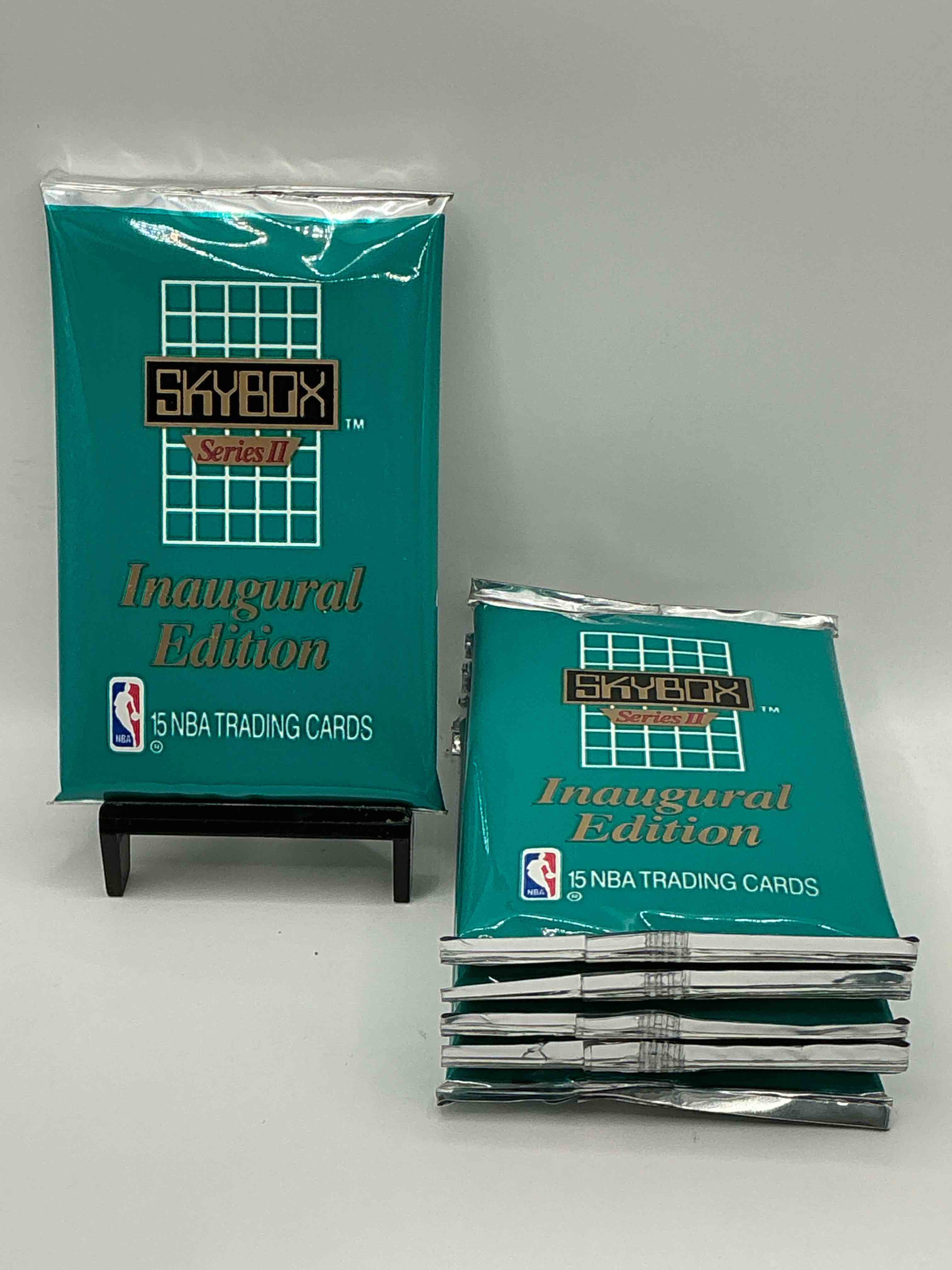 michael jordan, magic johnson & more! search for so many nba legends & stars! 1990 skybox unopened packs, series ii! direct from original box! these packs are sought after for ther eye-catching teal look & awesome cards! search for valuable michael jordan, larry bird & magic johnson cards! along with other stars!