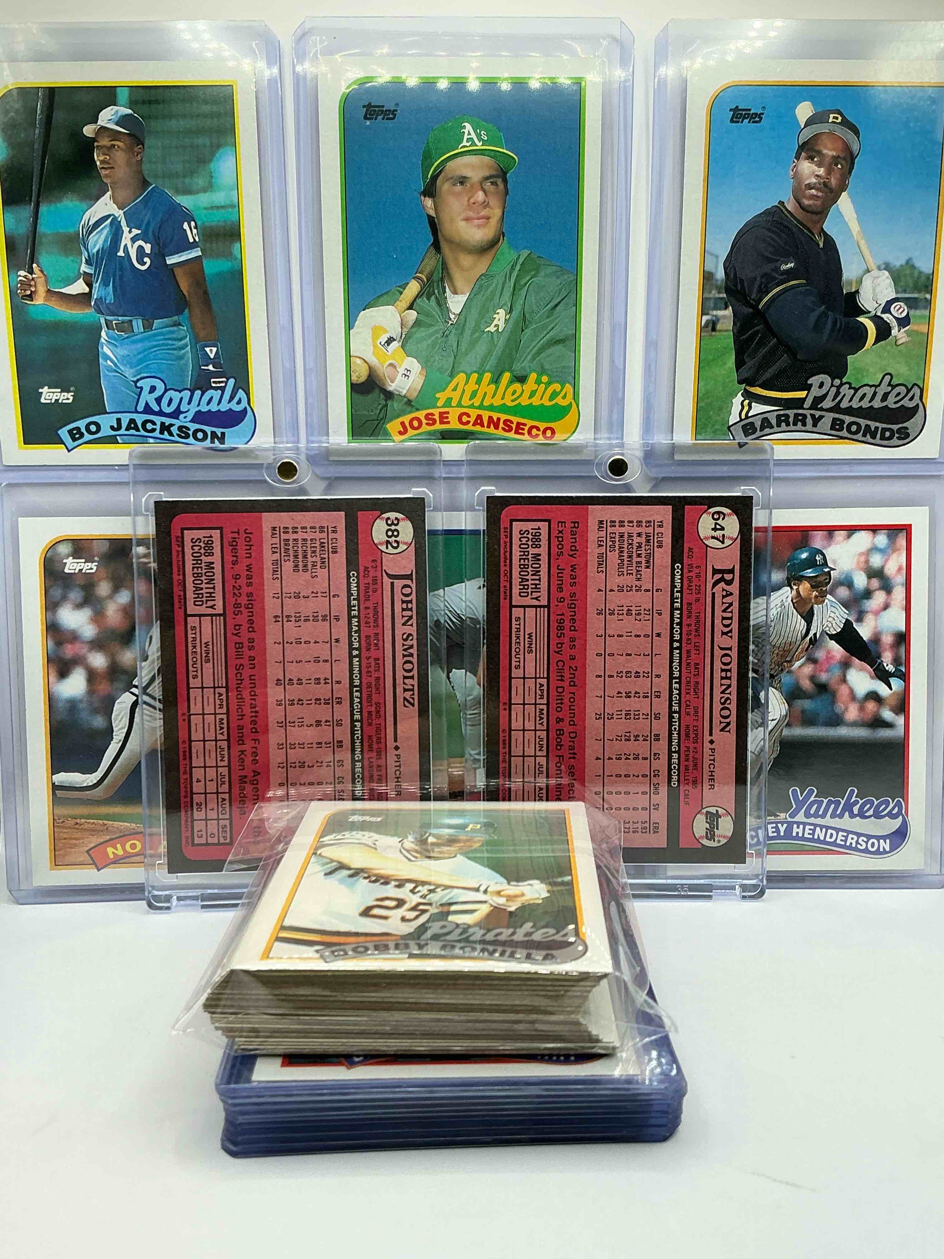 Condition photo showing New/Like New for Randy Johnson & John Smoltz Rookies! 1989 Topps Baseball 50 Card Craziness! Bo Jackson, Randy Johnson, Barry Bonds, John Smoltz, Kirby Puckett, Tom Glavine, Rickey Henderson, Don Mattingly, Cal Ripken, Wade Boggs, Doc Gooden, Greg Maddux, Fernando Valenzuela, Nolan Ryan, Roger Clemens, George Brett, Tony Gwynn & More! The BEST Players From The Time! Super Rare Set With All Of These Stars! 50 Card Craziness! Legends, Heroes & Commons!