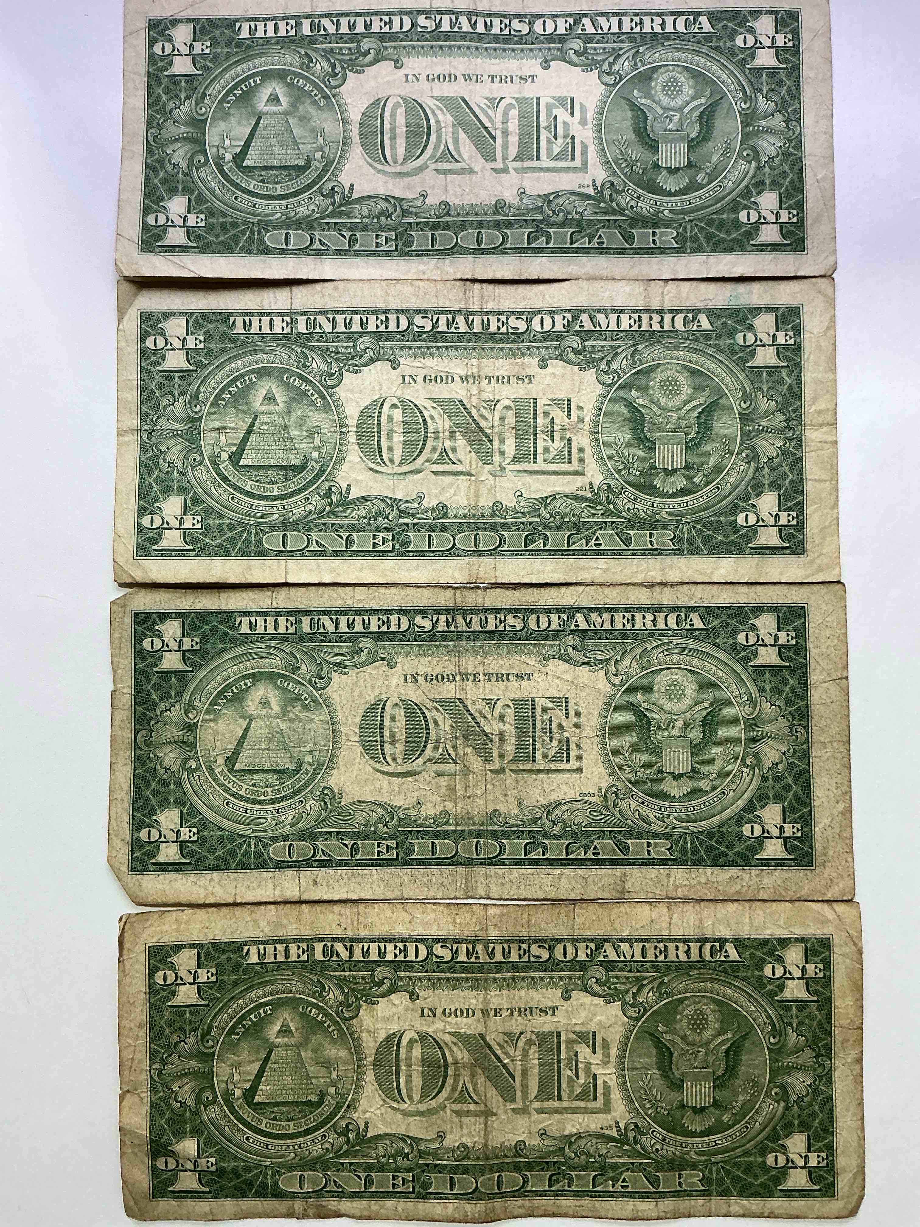 Condition photo showing Good Condition for 1957 Silver Certificates! Did You Know That Prior To 1964 One Dollar U.S. Paper Money Was Actually Redeemable For Silver Dollars?! Wow How Times Have Changed! Silver Certificates Were Produced From 1878 To 1964 & Are Still Considered Legal Tender At Face Value. Here Are Gorgeous, Circulated 1935 & 1957 U.S. One Dollar Silver Certificate, With Highly Collectible "Blue Seal!* Own An Awesome Piece Of History!