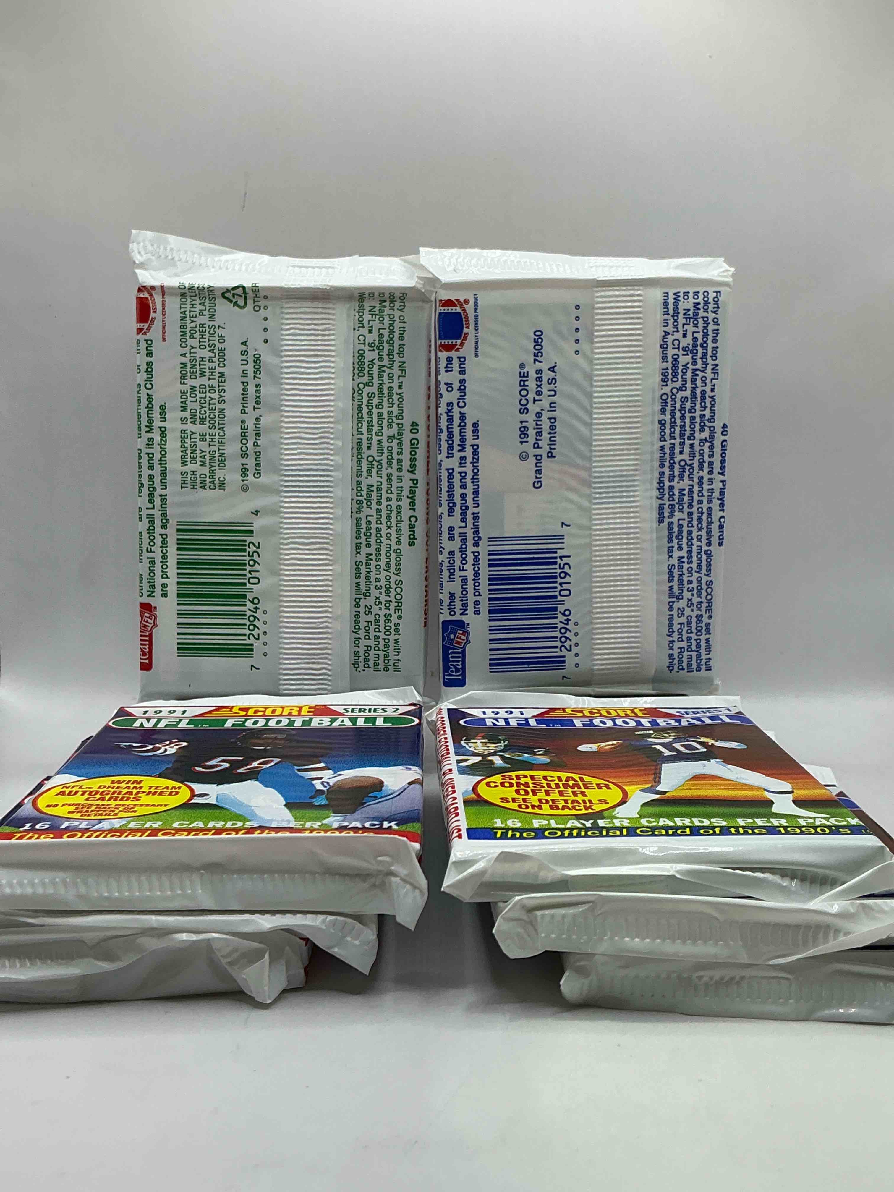 Condition photo showing New/Like New for 1991 NFL Score Football Sealed Card Packs Series I & II, Direct From Original Retail Case! These Cards Are Sought After By Collectors For Their Awesome, Nostalgic Look. Search For Brett Favre Rookie, Early Jerry Rice, Early Emmit Smith, Joe Montana & So Much More!