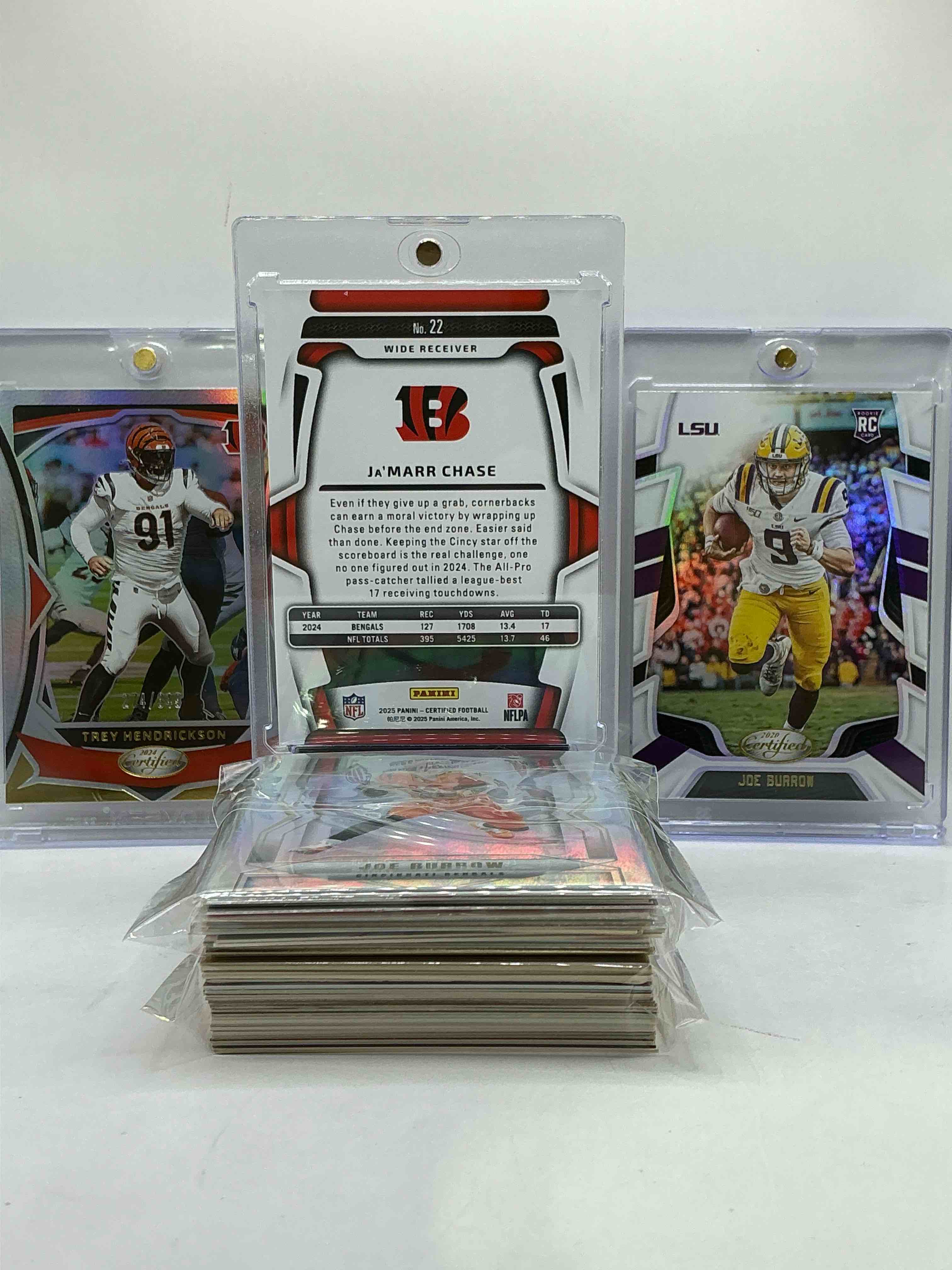 Condition photo showing New/Like New for Ja’marr Chase Panini Certified /299 Purple Card, Trey Hendrickson /149 Panini Certified & Joe Burrow Panini Certified Rookie & More! Insane Trio! This 50 Card Lot Includes Commons, Vintage & New Legends & More!