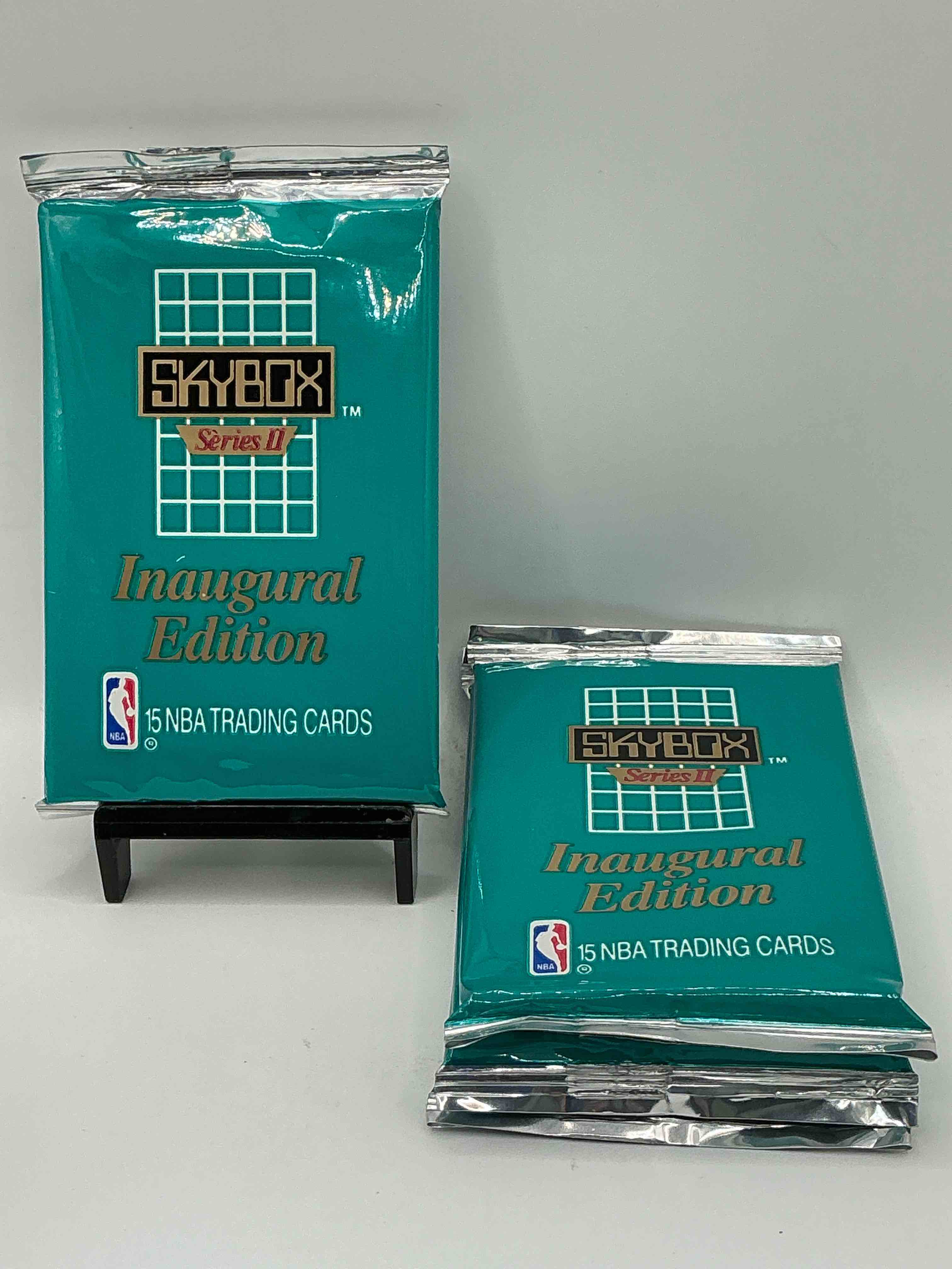 michael jordan, magic johnson & more! search for so many nba legends & stars! 1990-91 skybox unopened packs, series ii! direct from original box! these packs are sought after for ther eye-catching teal look & awesome cards! search for valuable michael jordan, larry bird & magic johnson cards! along with other stars!