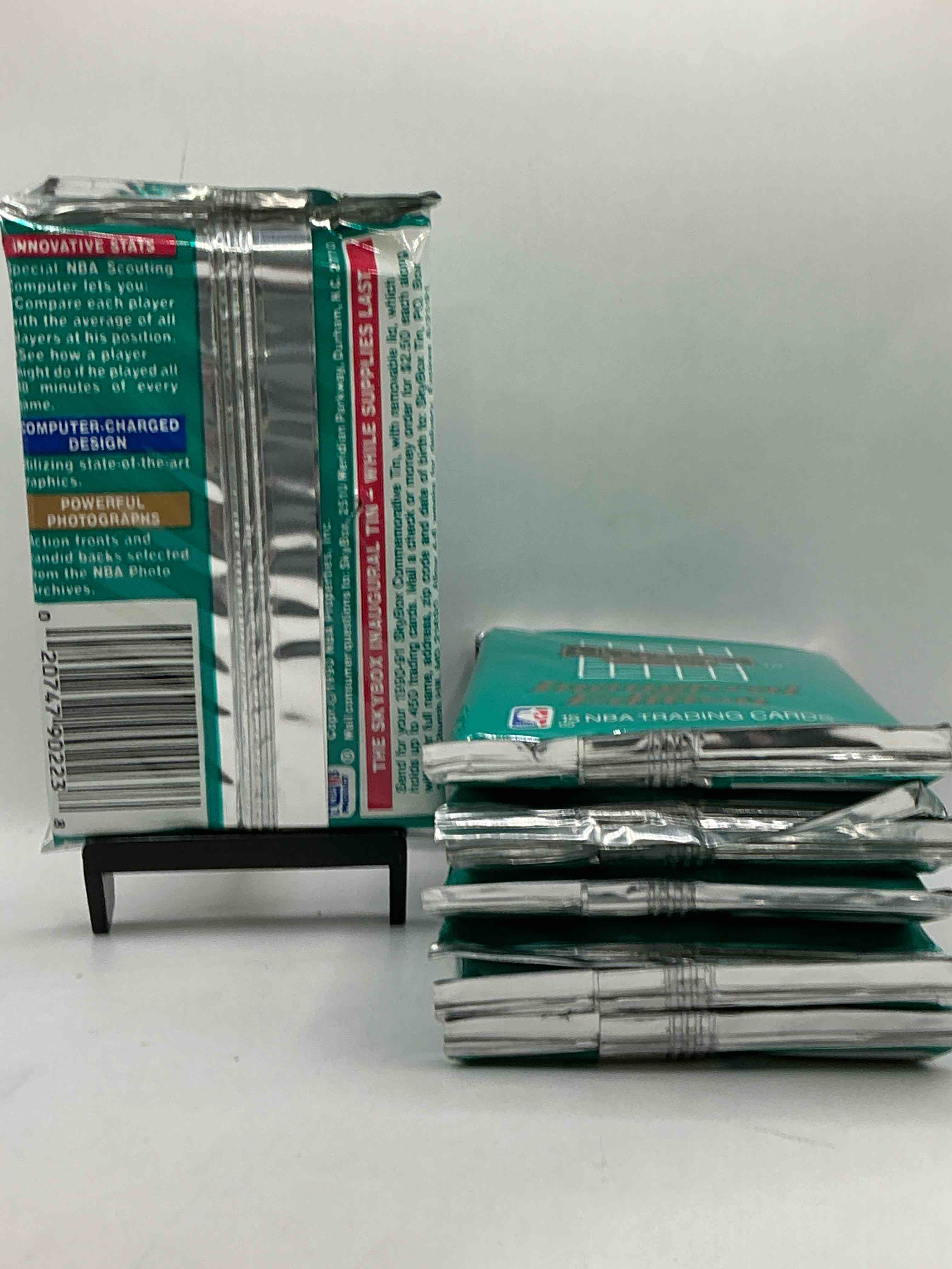 Condition photo showing New/Like New for Michael Jordan, Magic Johnson & More! Search For So Many NBA Legends & Stars! 1990-91 Skybox Unopened Packs, Series I! Direct From Original Box! These Packs Are Sought After For Ther Eye-Catching Teal Look & Awesome Cards! Search For Valuable Michael Jordan, Larry Bird & Magic Johnson Cards! Along With Other Stars!