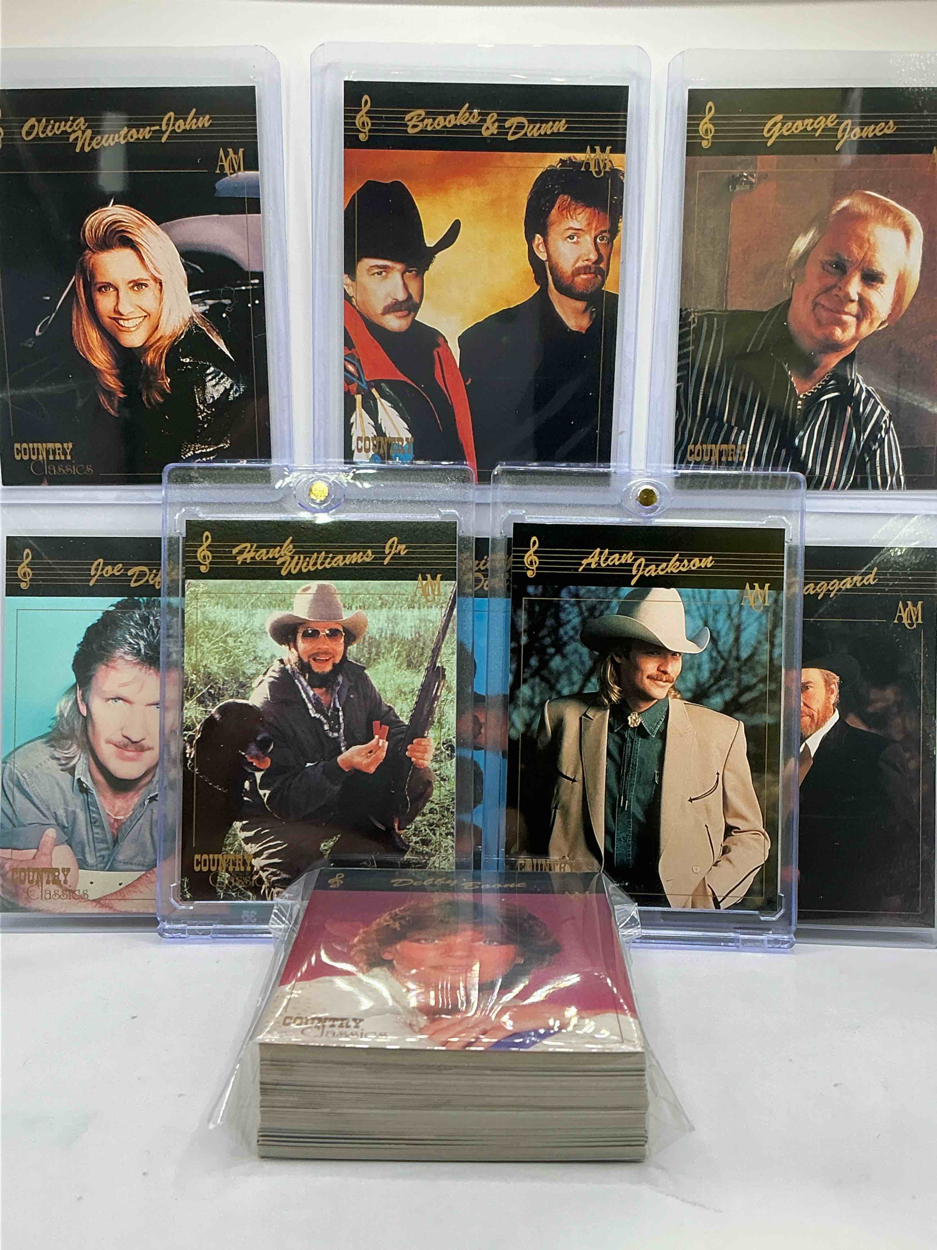 Condition photo showing New/Like New for Hank Williams Jr! Alan Jackson! NO WAY! Country Music Craziness! Olivia Newton John, George Jones, Nitty Gritty, Joe Diffe & More! Insane 50 Card Country Music Lot! 1992 Cards, Some Of The Biggest Names In The Country World! PERFECT For Vintage, Authentic & Real Country Fans! 