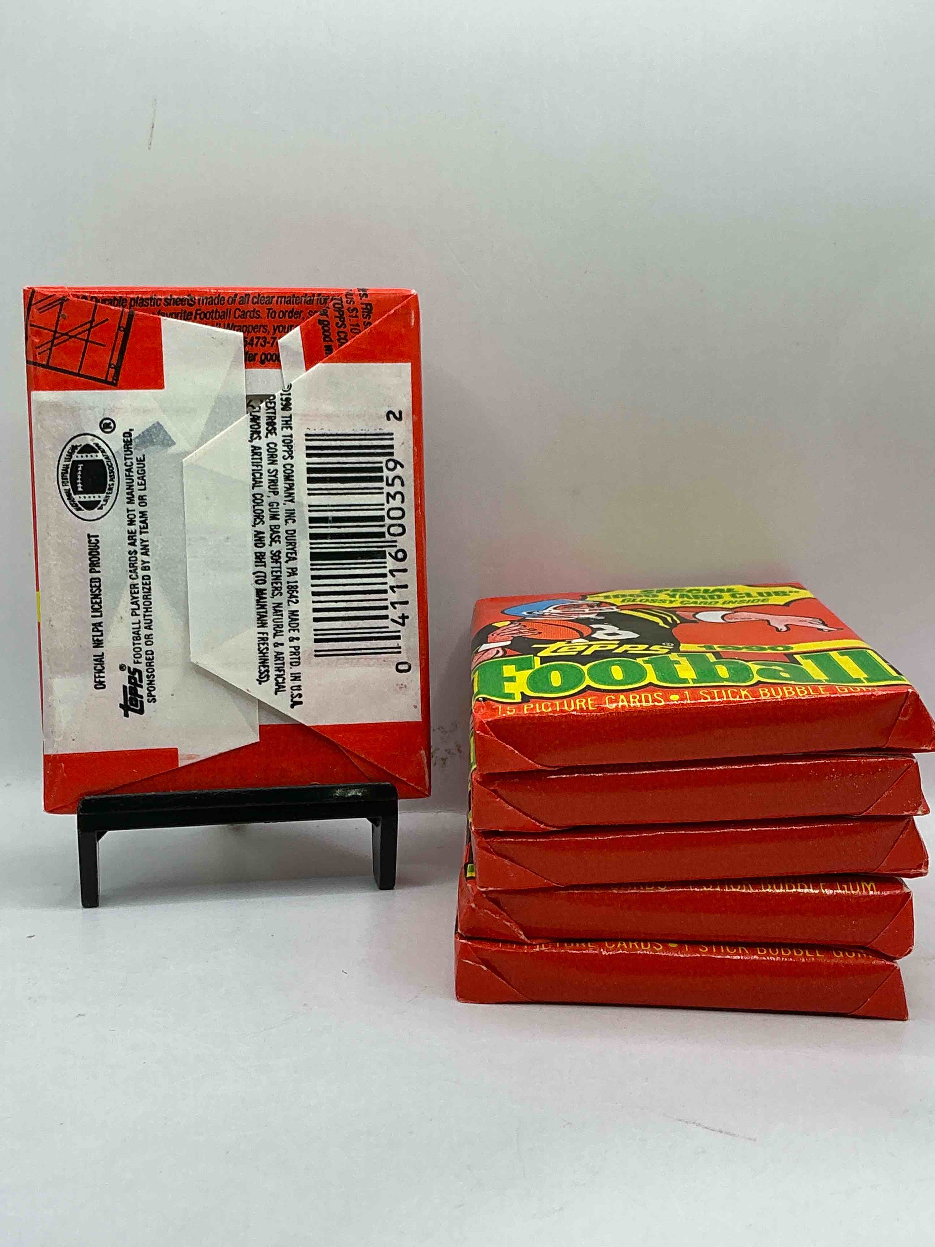 Condition photo showing New/Like New for The Last Year Of Football Wax! Joe Montana, Emmitt Smith & Barry Sanders!? 1990 Topps Football Unopened Sports Card Wax Pack, Direct From Original Retail Box! Getting Hard To Find! Search For Early Barry Sanders & Jerry Rice & So Much More!