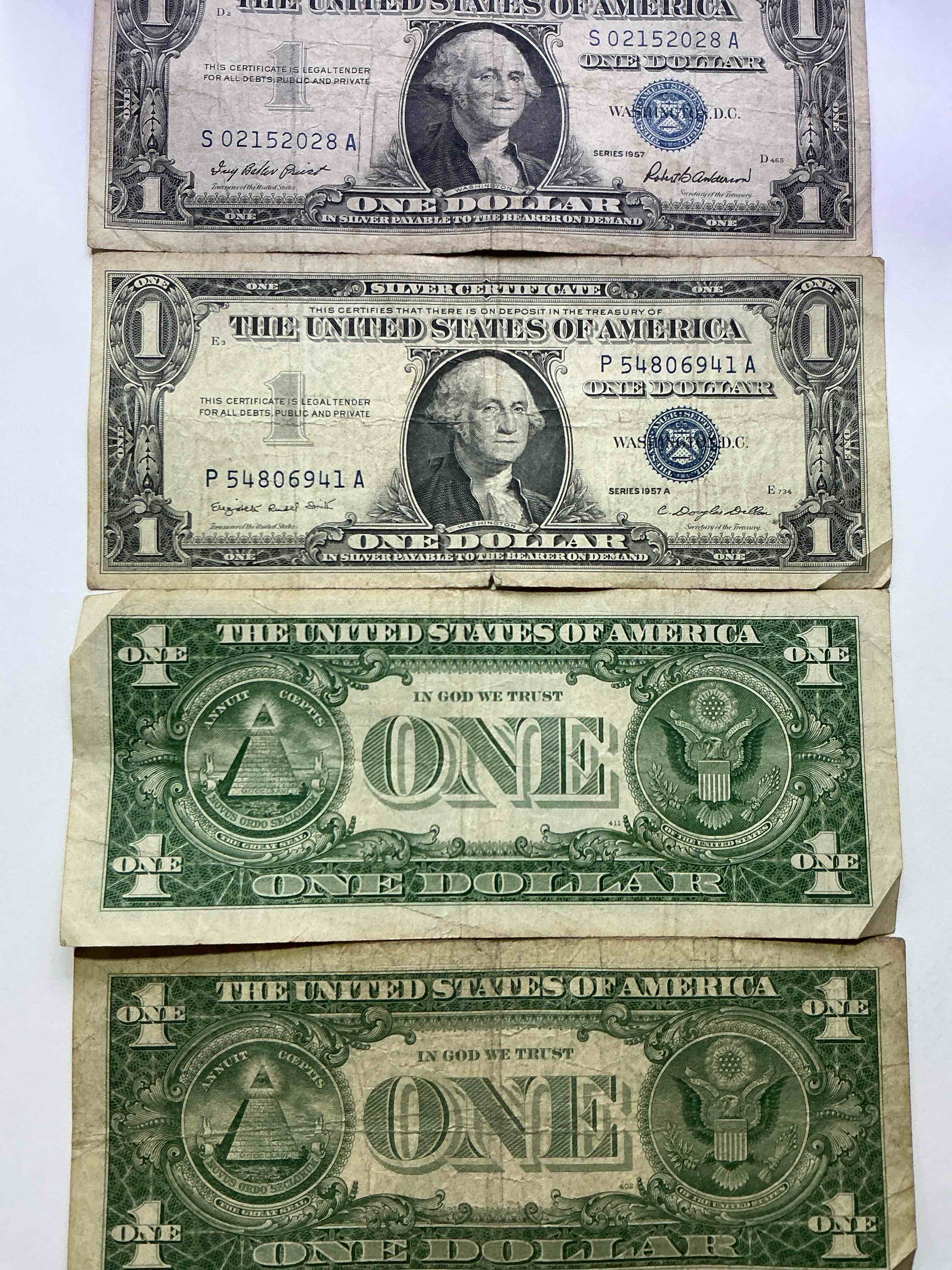 Condition photo showing Good Condition for 1957 Silver Certificates! Did You Know That Prior To 1964 One Dollar U.S. Paper Money Was Actually Redeemable For Silver Dollars?! Wow How Times Have Changed! Silver Certificates Were Produced From 1878 To 1964 & Are Still Considered Legal Tender At Face Value. Here Are Gorgeous, Circulated 1935 & 1957 U.S. One Dollar Silver Certificate, With Highly Collectible "Blue Seal!* Own An Awesome Piece Of History!