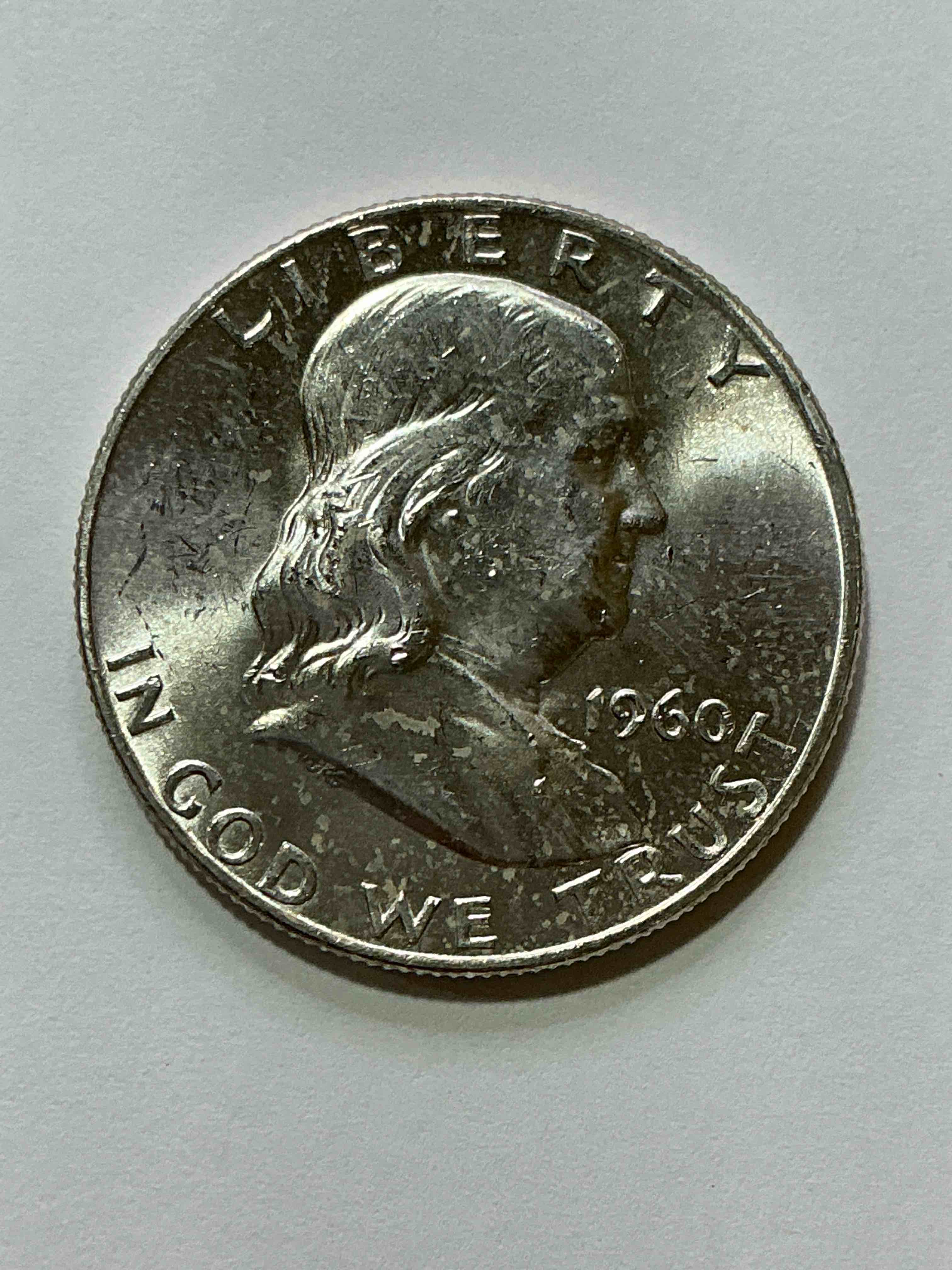 Uncirculated Ben Franklin Silver! Pre 1965 Silver U.S. Half Dollar Coins! Before 1965 American Half Dollars Were Actually Silver, Here Is A Rare 1960 Version in Excellent, Uncirculated Condition! Great For Investing In Precious Metals! These Heavy Half Dollars Were Minted At 90% Silver and 10% Copper, Giving Them A Net Weight Of .36 Ounces Of Pure Silver Per Coin! Very Rare In This Great. Condition!