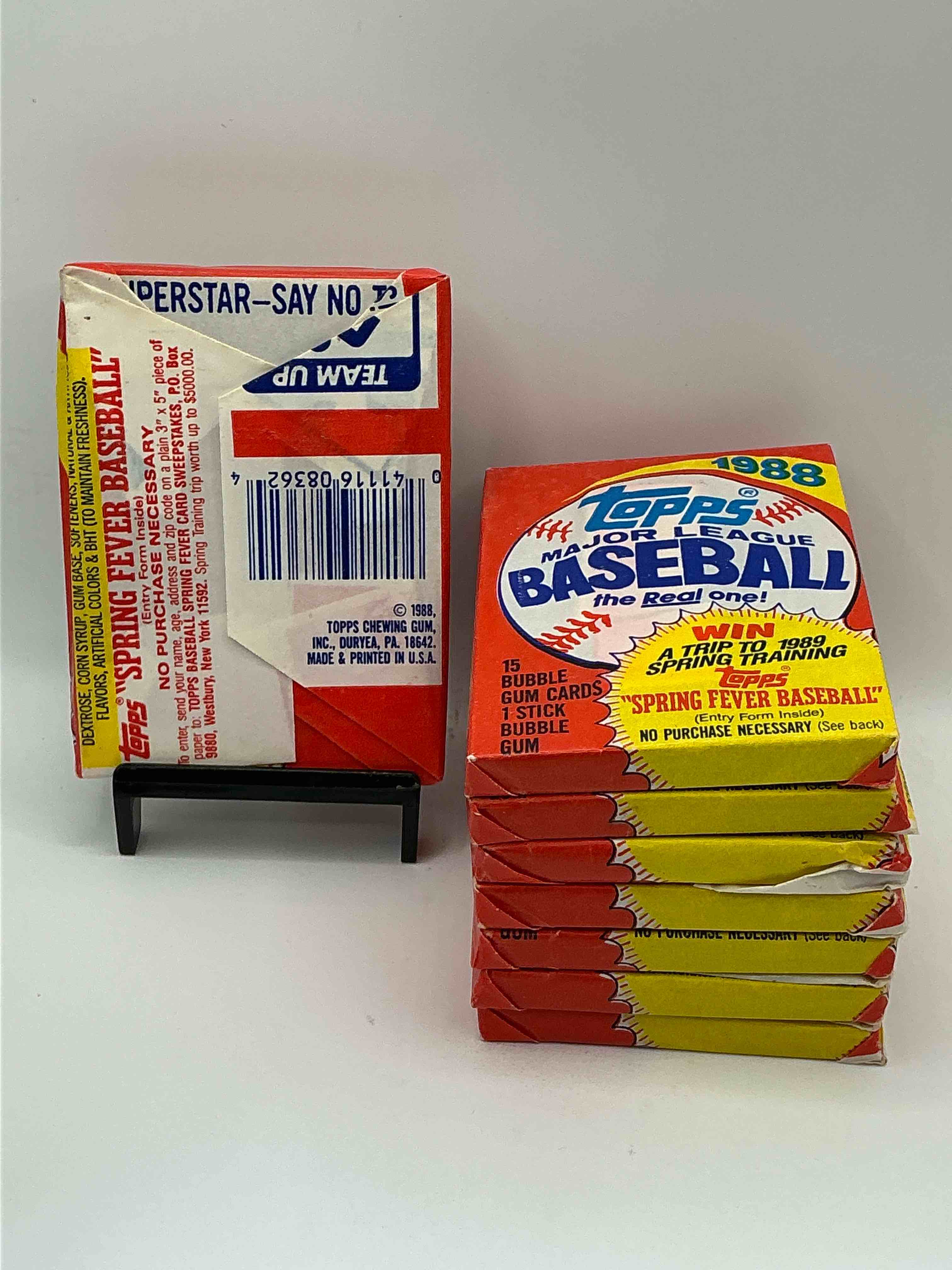 Condition photo showing New/Like New for 80's baseball fan's rejoice! 1988 topps baseball unopened wax packs full of collectible trading cards! search for valuable don mattingly "world of baseball" & nolan ryan cards worth hundreds in perfect condition!