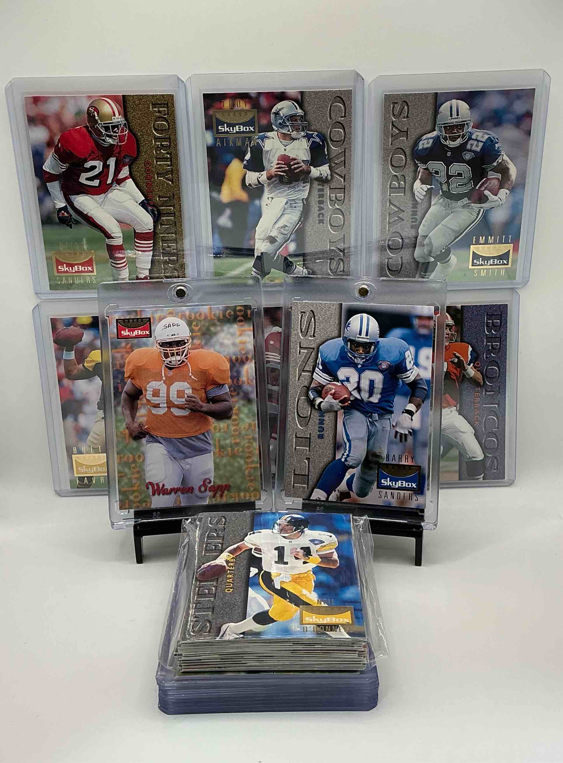 warren sapp & tony boselli rookie! 1995 skybox football 50 card set! barry sanders, emmitt smith, troy aikman, john elway & so many more, along with 50 other legends, heroes, commons & rookies! the best players from 1995 all in one place!