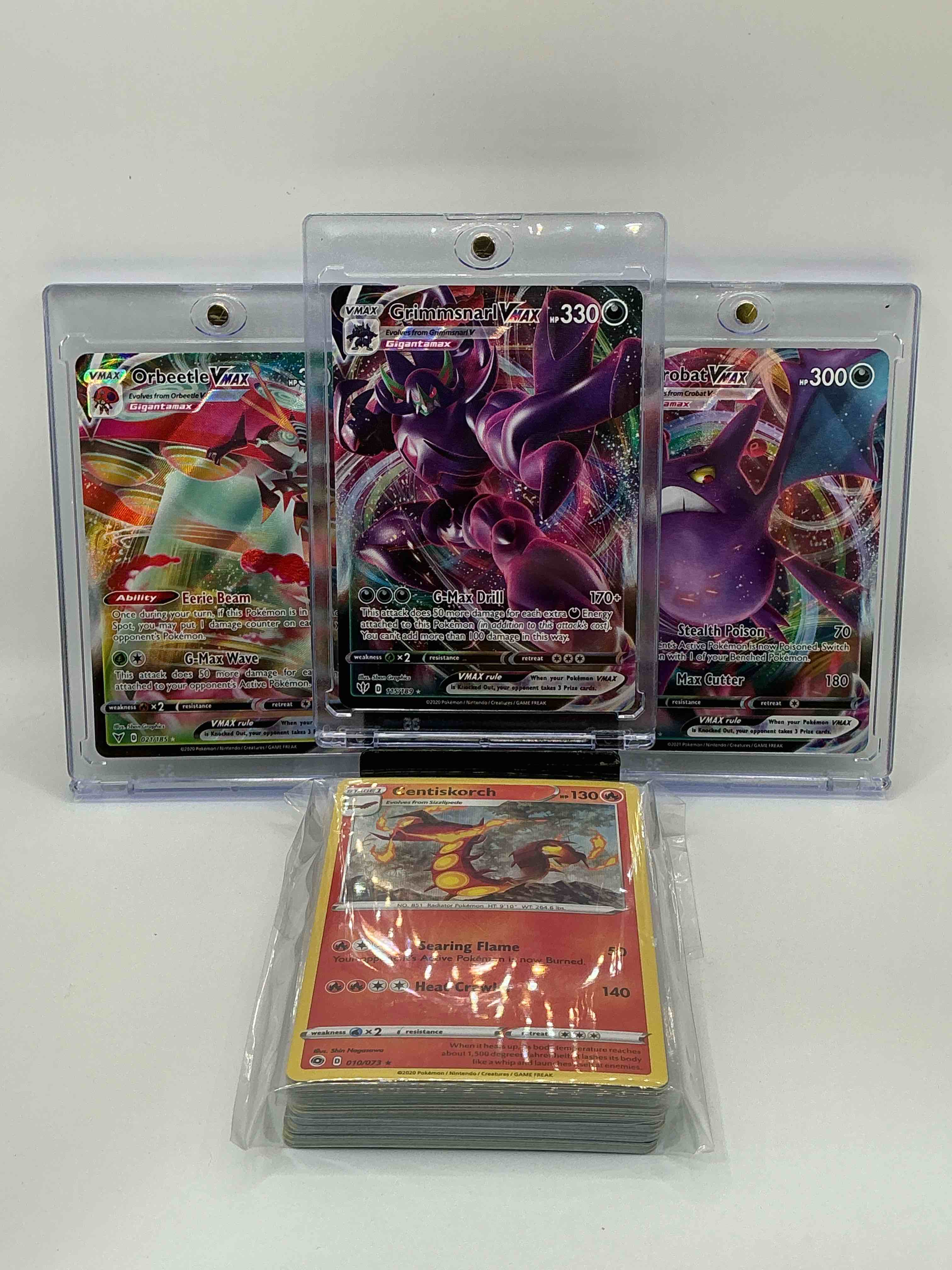 pokémon palooza! grimmsnarl vmax! orbeetle vmax! crobat vmax! along with 50 other pokémon heroes, holos, legends & commons!
