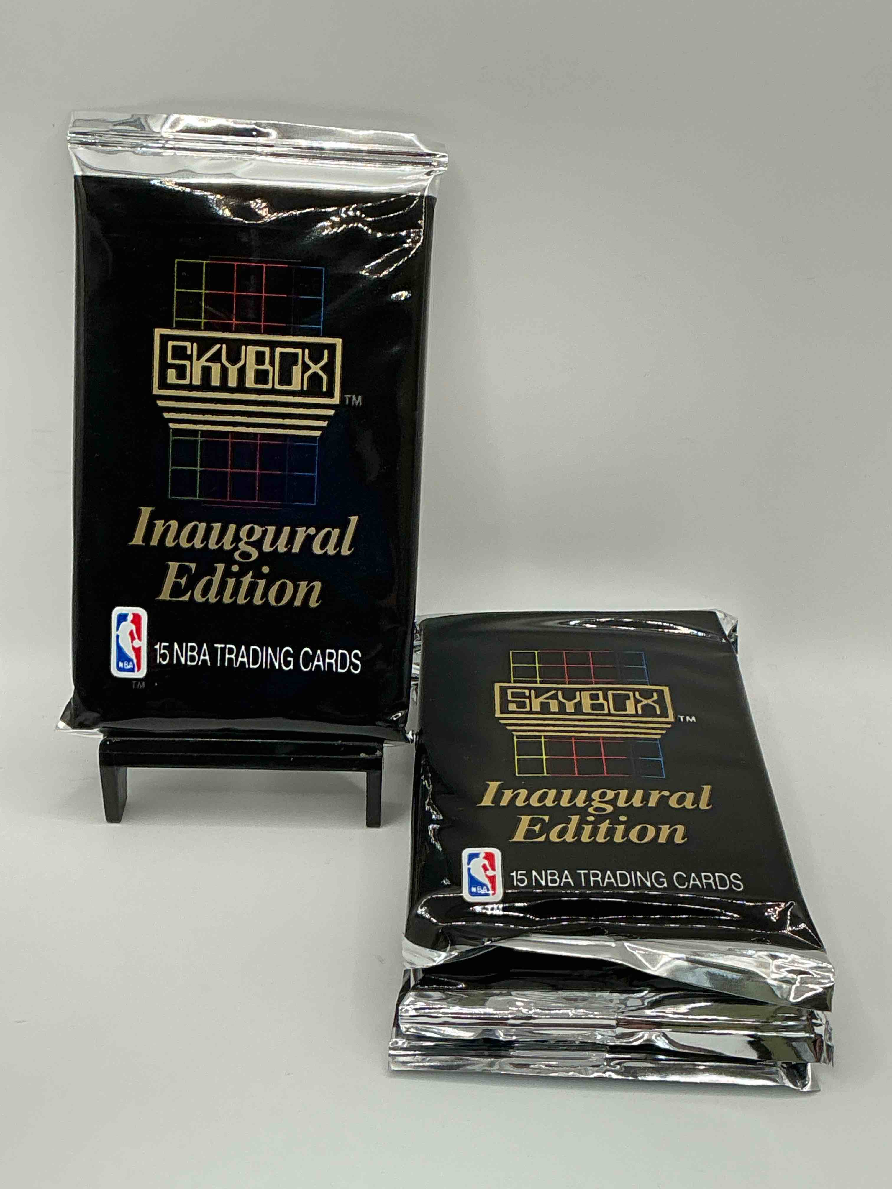 michael jordan, magic johnson & more! search for so many nba legends & stars! 1990-91 skybox unopened packs, series i! direct from original box! these packs are sought after for ther eye-catching teal look & awesome cards! search for valuable michael jordan, larry bird & magic johnson cards! along with other stars!
