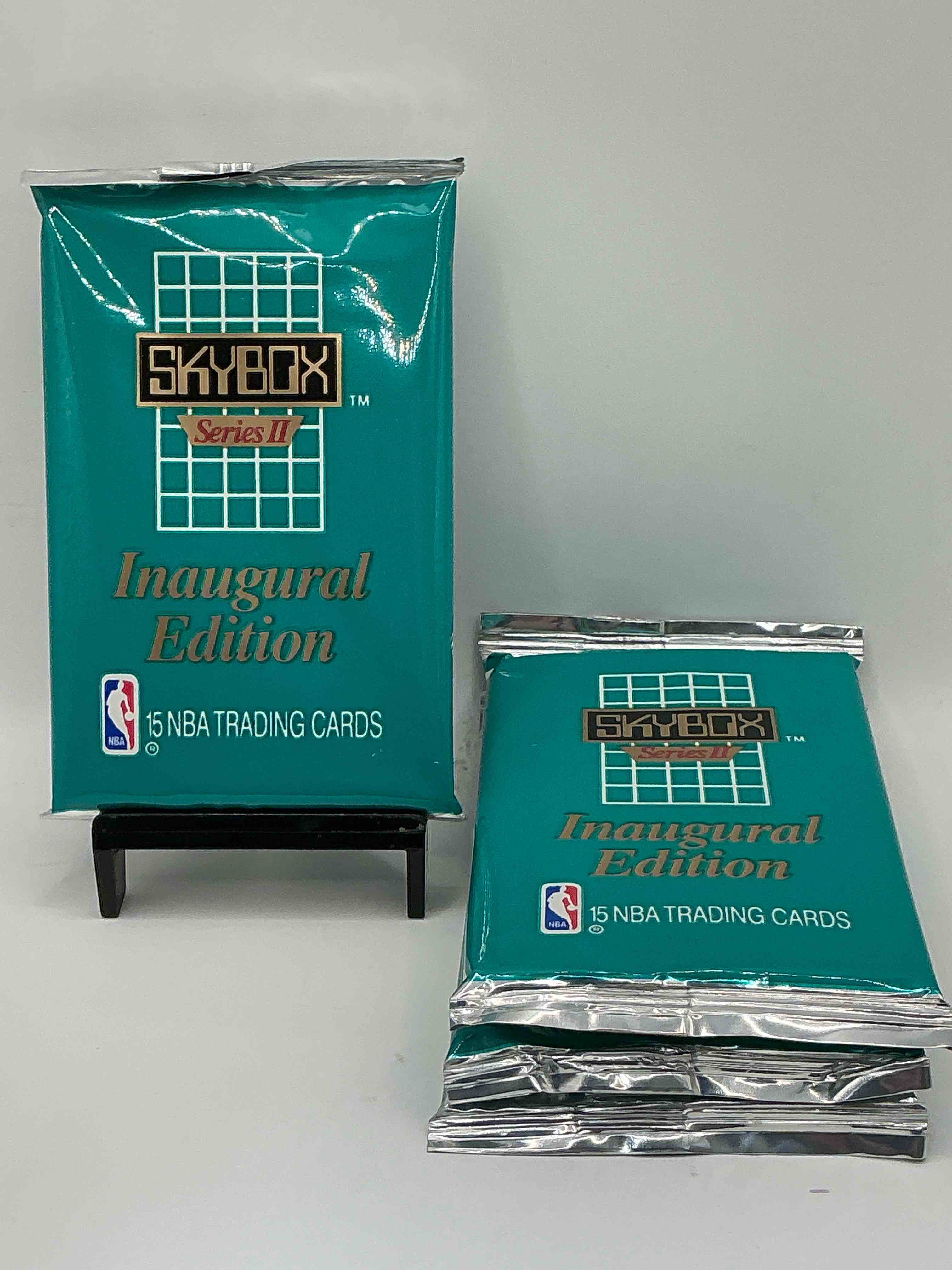 michael jordan, magic johnson & more! search for so many nba legends & stars! 1990-91 skybox unopened packs, series ii! direct from original box! these packs are sought after for ther eye-catching teal look & awesome cards! search for valuable michael jordan, larry bird & magic johnson cards! along with other stars!