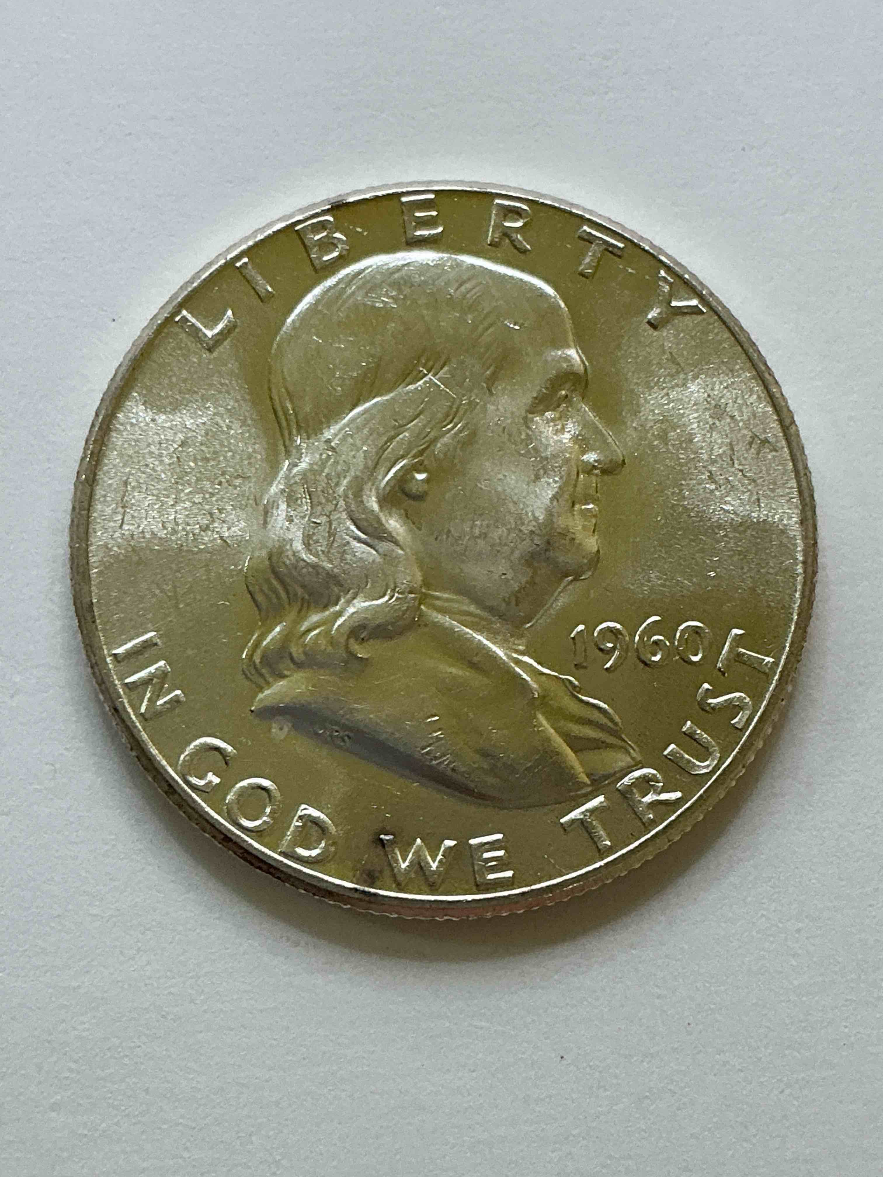 uncirculated ben franklin silver! pre 1965 silver u.s. half dollar coins! before 1965 american half dollars were actually silver, here is a rare version in excellent, uncirculated condition! great for investing in precious metals! these heavy half dollars were minted at 90% silver and 10% copper, giving them a net weight of 36169 ounces of pure silver per coin! very rare in this great. condition!