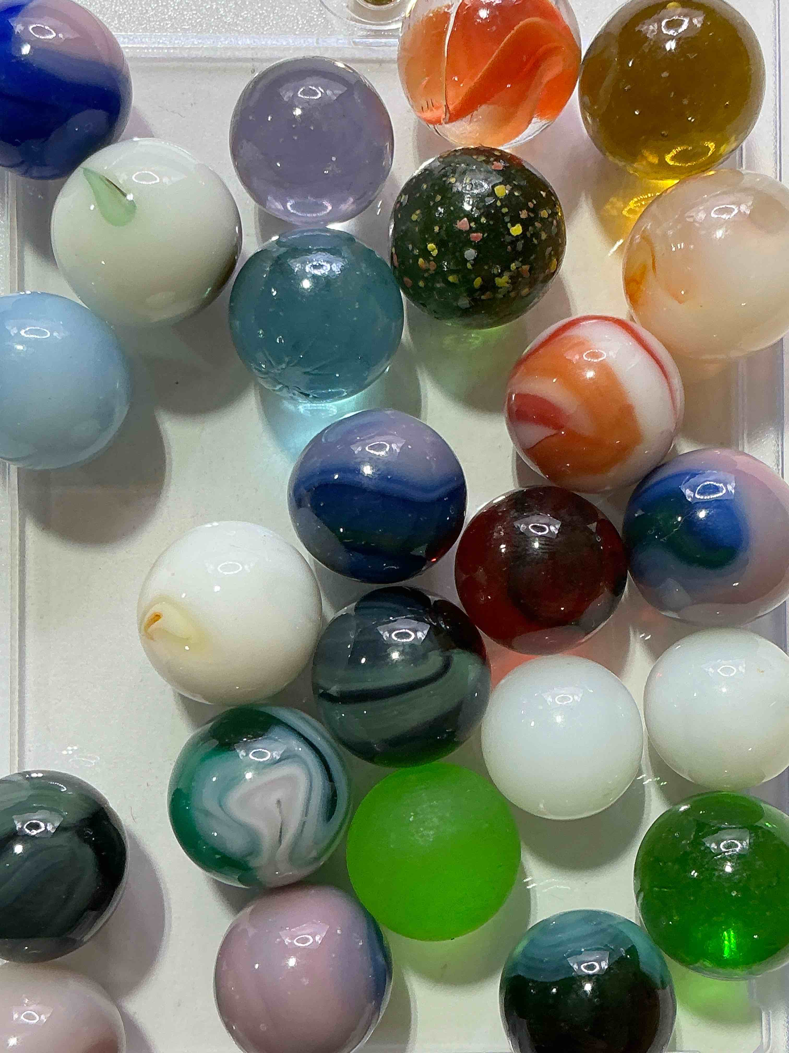 Condition photo showing New/Like New for Antique Glass Marbles! Genuine Stunning Marbles Lot, All Marbles Made Between The Years 1925-1965 & Made With Uranium! Many Are Great Depression Era & Even Earlier! Gorgeous, Authentic Pieces Of History!