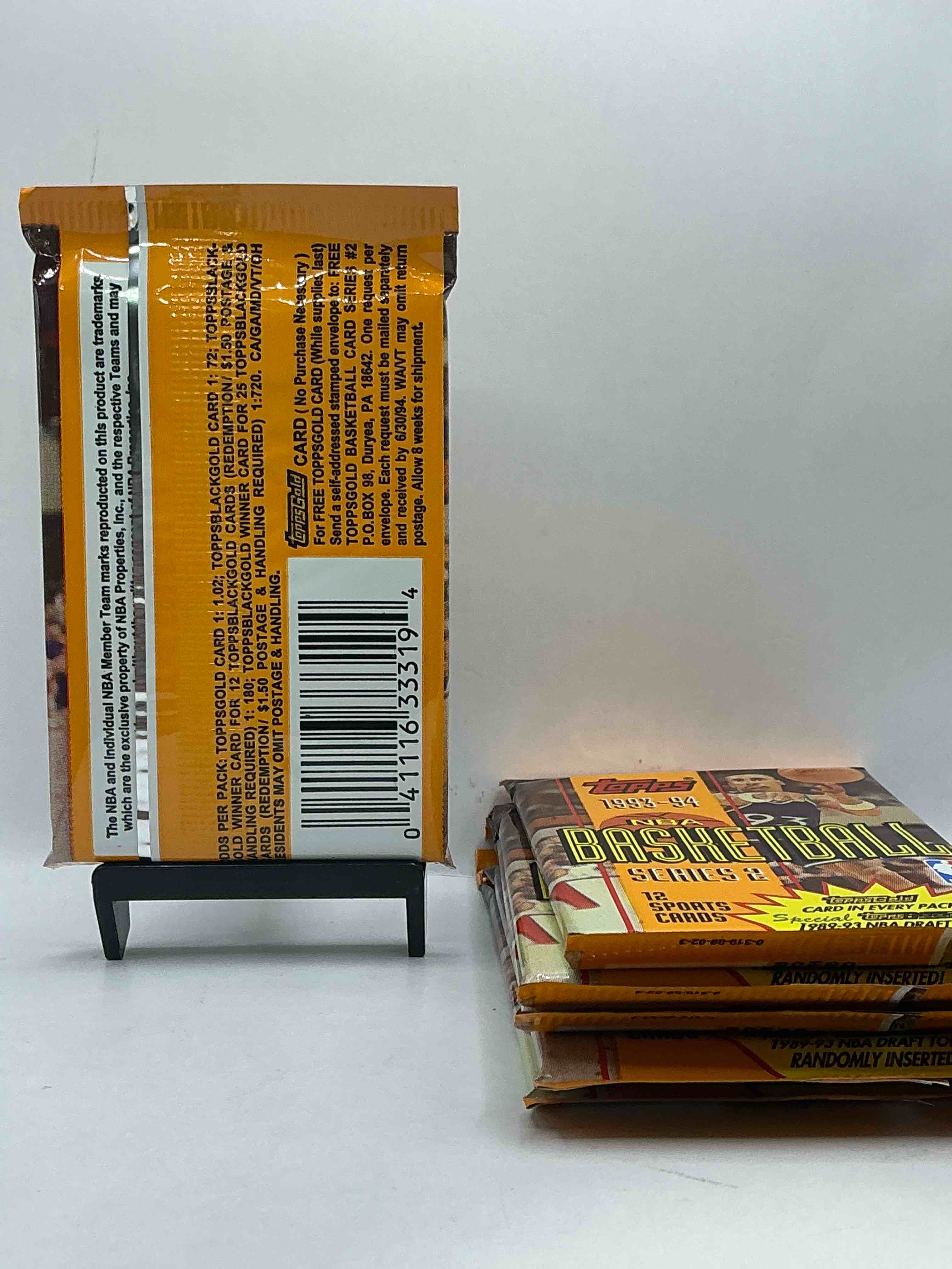 Condition photo showing New/Like New for NBA Bonanza! 1993- 94 Topps Basketball Packs! 12 Premium Basketball Cards In Each Pack! Search For Legends & Rookies Alike! Look For Michael Jordan, Shag O'Nell, Hakeem Olajuwon & More Ist Day Issue Cards, Frequent Flyer Cards, Members Only Cards & Rookies From Hardaway & Webber! Possible Pippen, Magic, Jordan, Robinson, Shaq, Olajuwon, Ewing & So Much More!