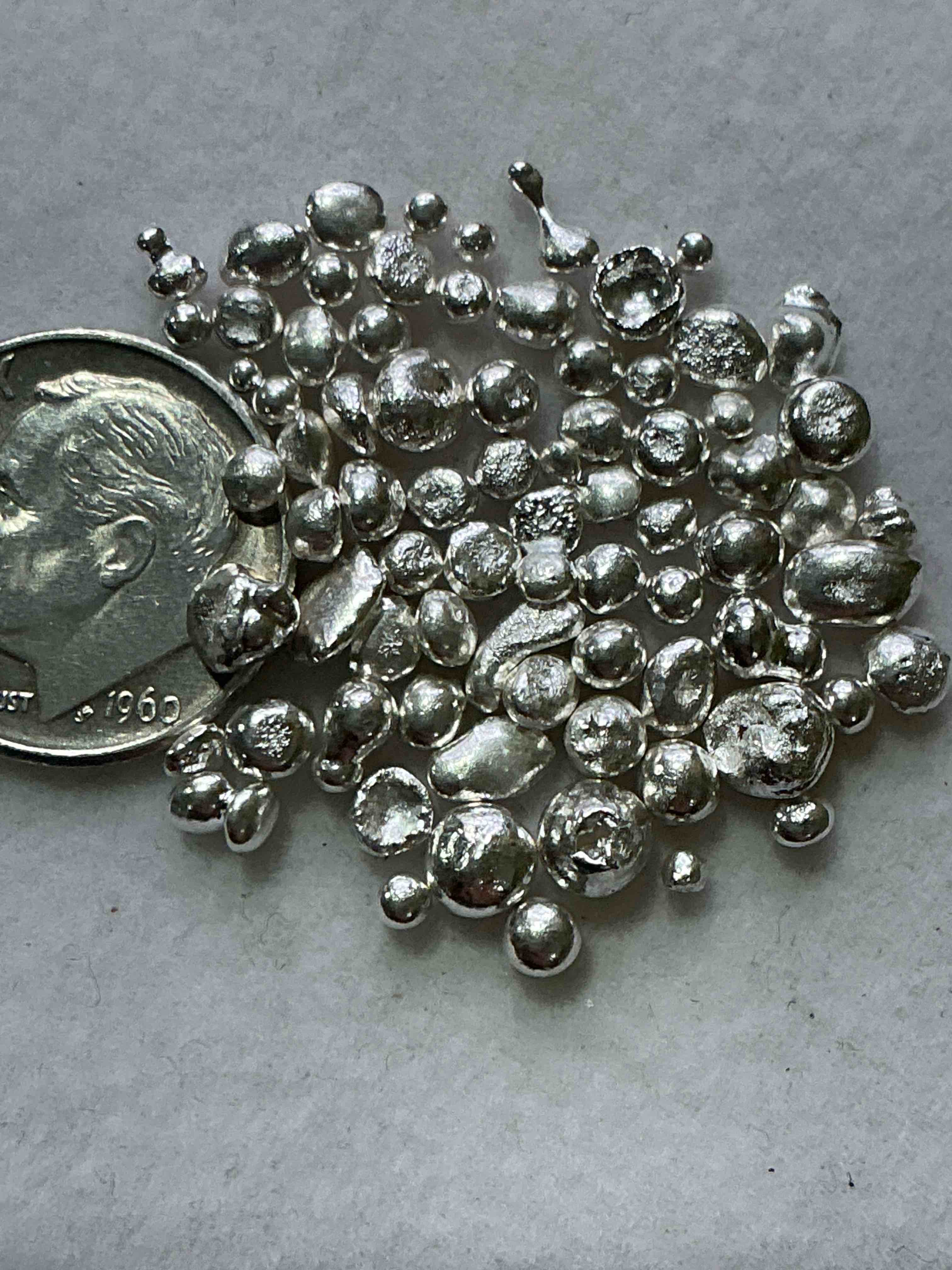 Condition photo showing New/Like New for Silver Nuggets! .999 US Fine Silver, In Small Nugget Form! Total Weight Of All Nuggets In Lot Approximately 6 Grams, Bid Is Per Nugget! A Cool Way To Invest In Fine US Silver! Includes Collector Capsule!