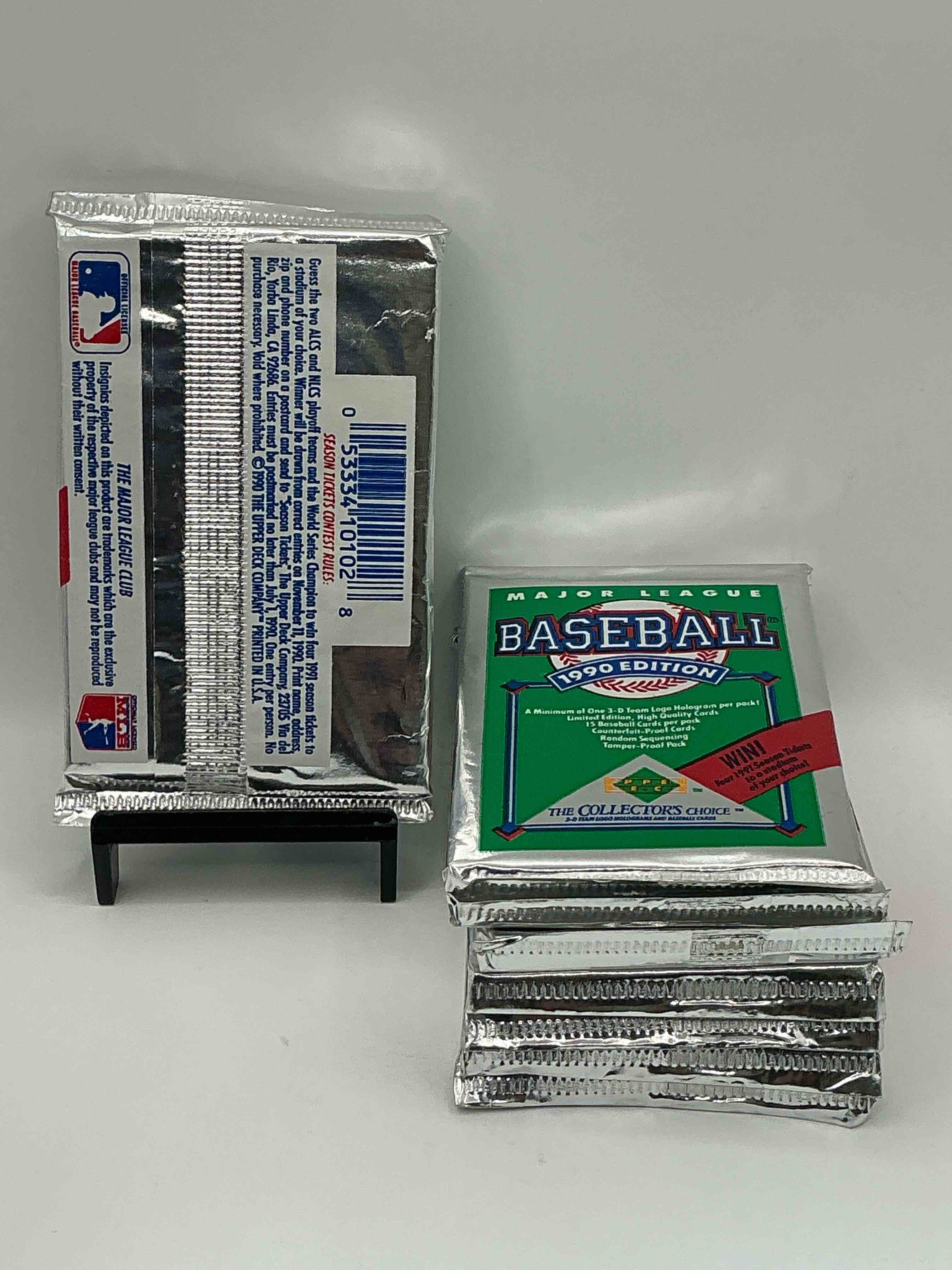 Condition photo showing New/Like New for 1990 Upper Deck Baseball Unopened Sports Trading Card Packs! Direct From Original Box! Look For Possible Collector's 3D Team Logo Card! As Well As Early Ken Griffey Jr. Cards!