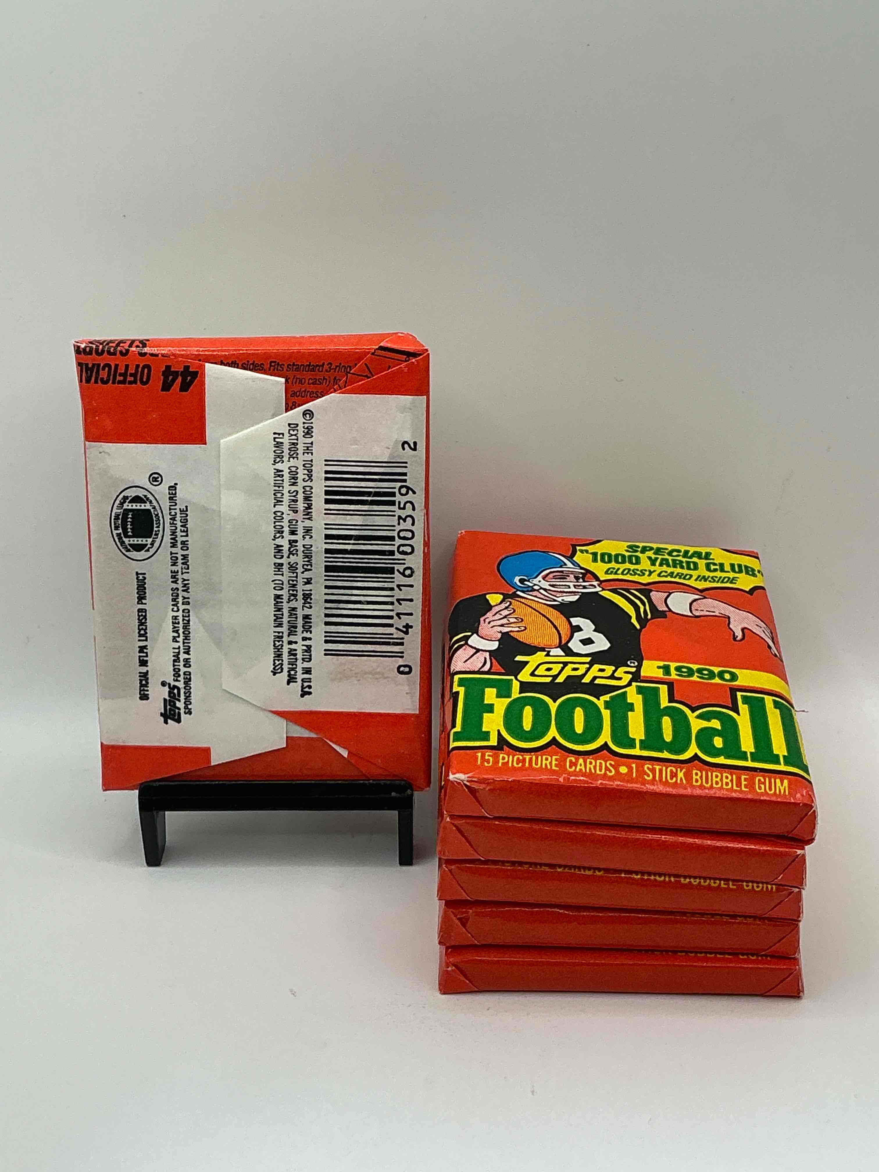 Condition photo showing New/Like New for The Last Year Of Football Wax! Joe Montana, Emmitt Smith & Barry Sanders!? 1990 Topps Football Unopened Sports Card Wax Pack, Direct From Original Retail Box! Getting Hard To Find! Search For Early Barry Sanders & Jerry Rice & So Much More!