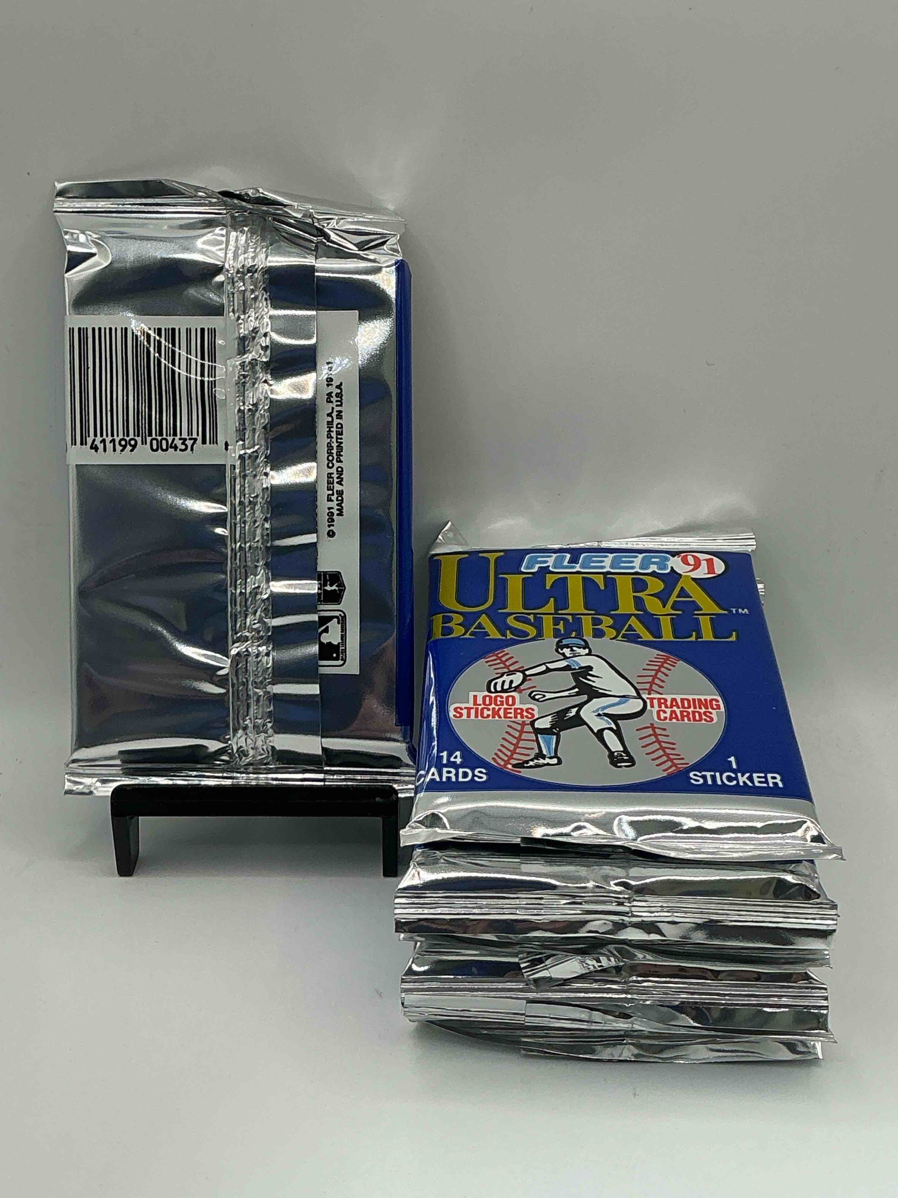 Condition photo showing New/Like New for 1991 Fleer Baseball Unopened Wax Pack, Direct From Original Sealed Retail Case Search For Griffey Jr. & Barry Bonds "Generation Stars" Combo Card #710 (PSA 10 Value $200), Nolan Ryan, Don Mattingly & So Much More!