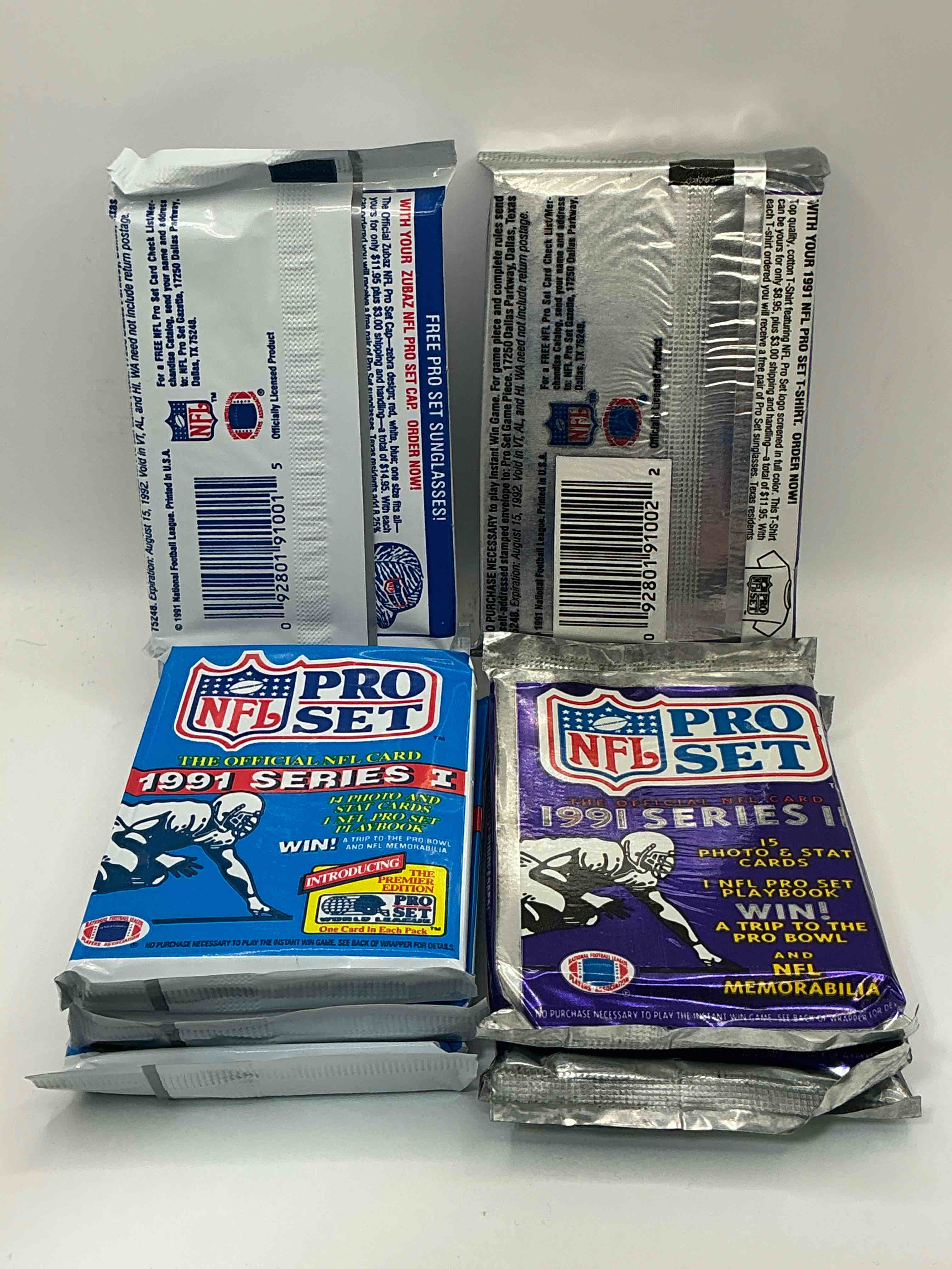 Condition photo showing New/Like New for 1991 Pro Set Platinum Edition Series I & II Unopened Packs! Search For Brett Favre Rookie & Bill Belichick Coach Rookie Card As Well As Santa Claus Card!