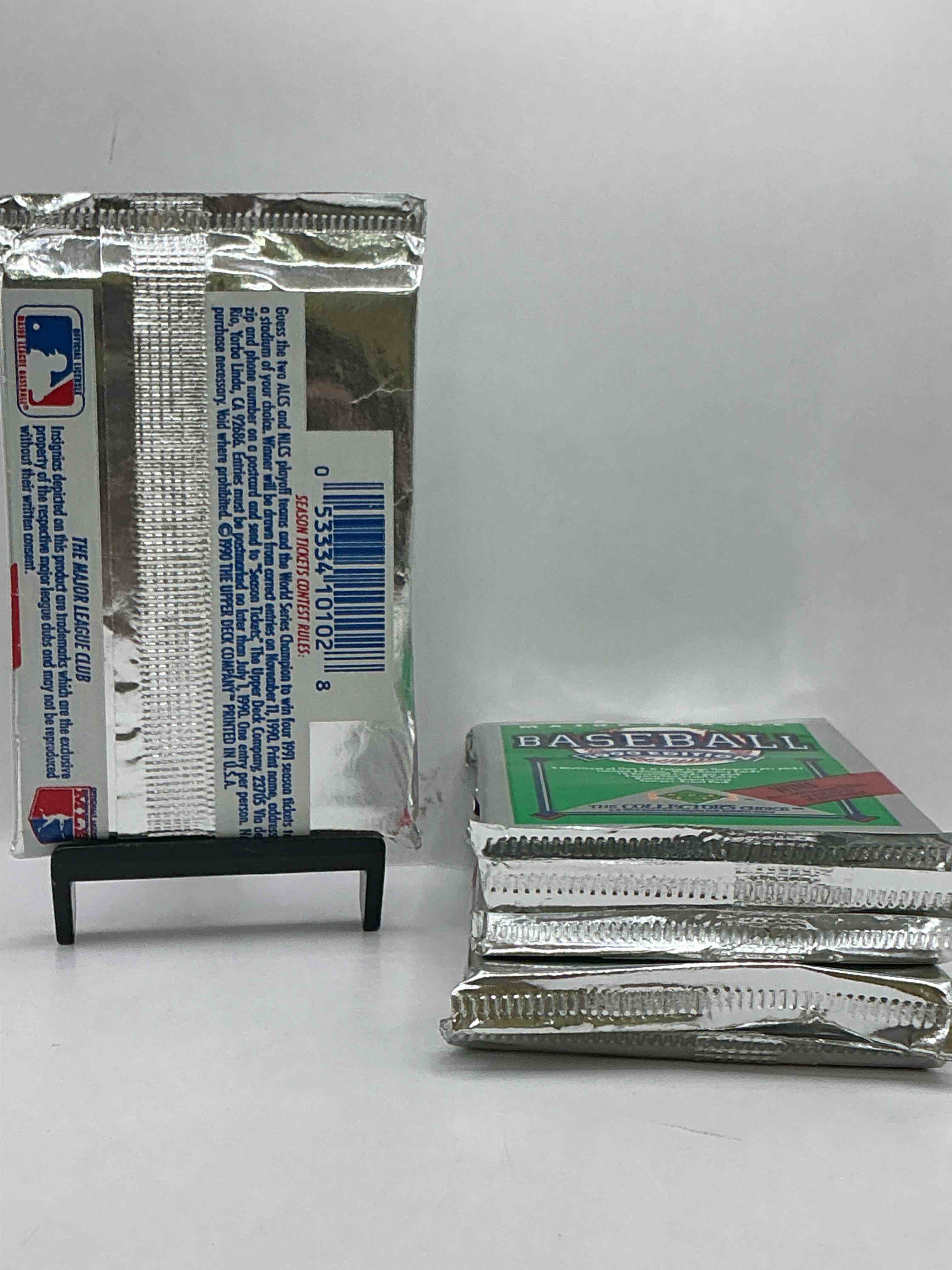 Condition photo showing New/Like New for 1990 Upper Deck Baseball Unopened Sports Trading Card Packs! Direct From Original Box! Look For Possible Collector's 3D Team Logo Card! As Well As Early Ken Griffey Jr. Cards!