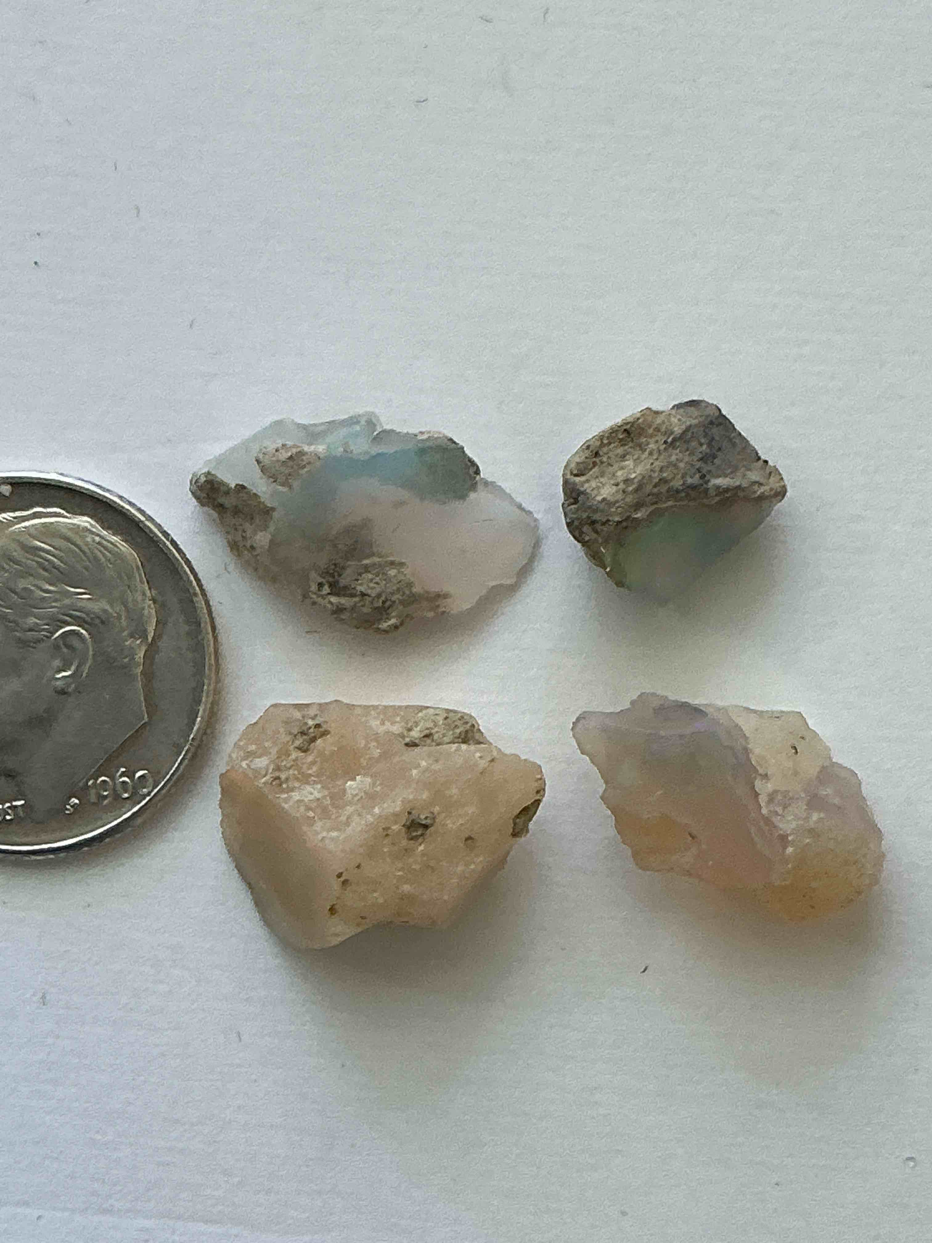Condition photo showing New/Like New for Opal Precious Gemstone, Raw, Authentic! Ethiopian Opal Gemstone, In Large & Raw, Prospected Form! Ethiopian Opals Are Famous For Their Stunning Clarity & Shimmering Color Hues! They Are Believed To Promote Hope, Purity & Love. The U.S. Dime In Image Is For Size Reference Only (Not Included). A Gemstone Like This In Raw Form Is Very Hard To Find! Own An Amazing, Stunning, Unique Opal Gemstone In Rare, Raw Form!
