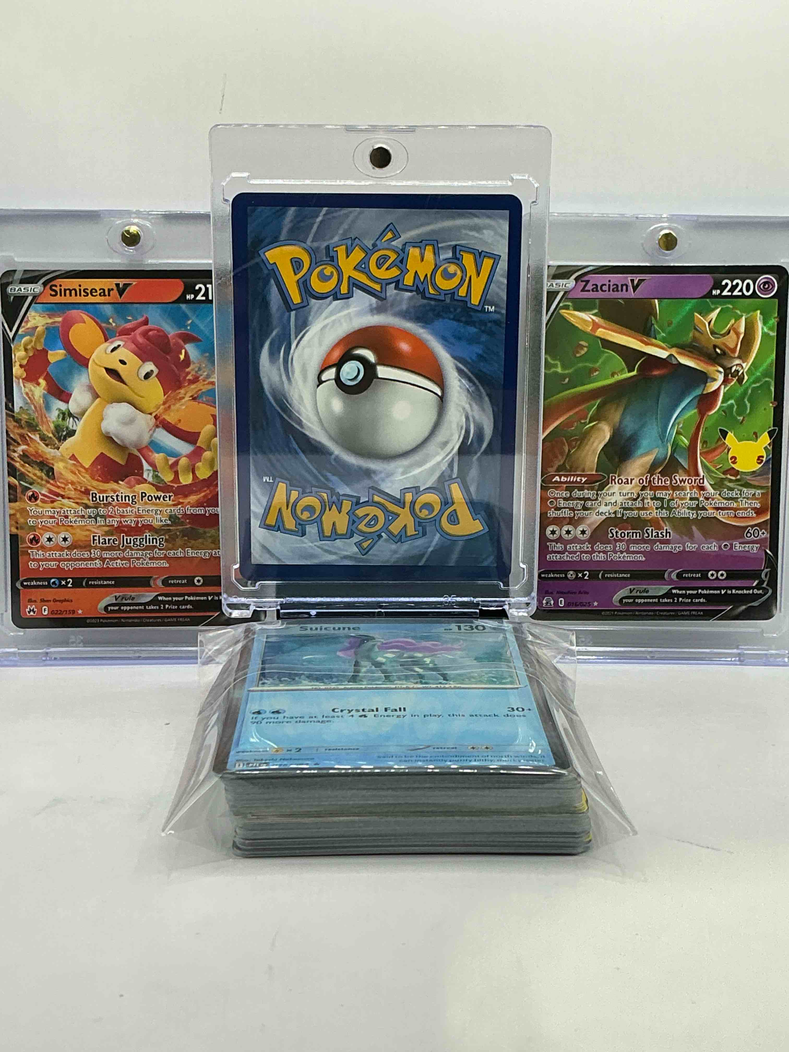 Condition photo showing New/Like New for Charizard V Holo! Zacain V Holo, Simisear V Holo & More! V Insanity! This 50 Card Lot Includes Commons, Legends & More! Monsters & More! 50 Card Craziness!
