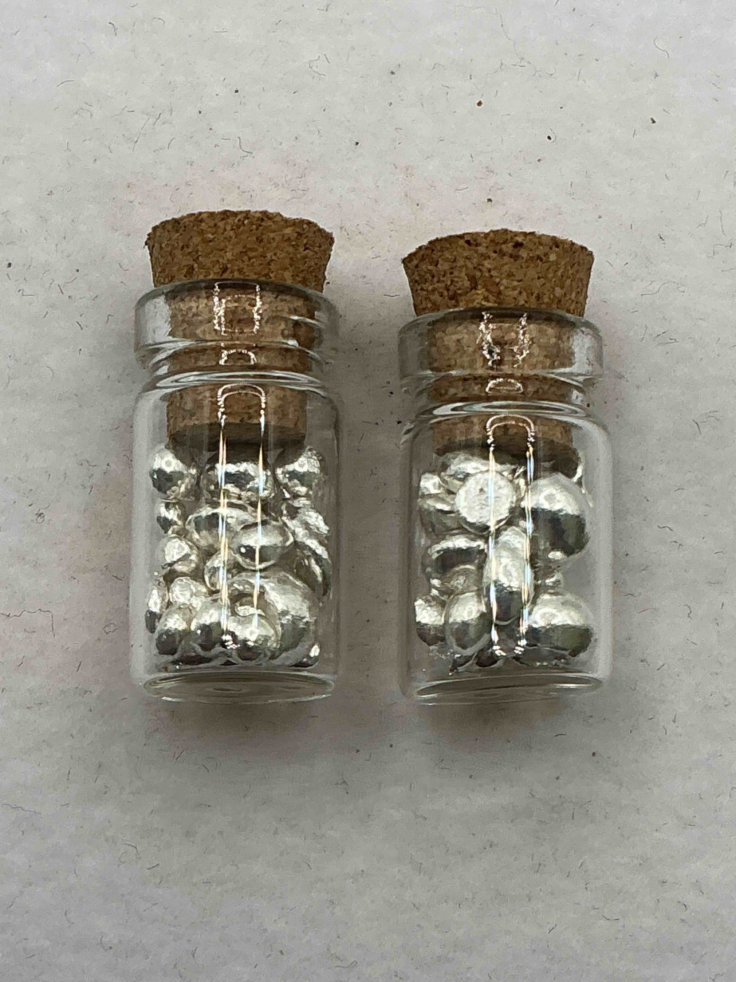 Silver Nuggets! .999 US Fine Silver, In Small Nugget Form! Total Weight Of All Nuggets In Lot Approximately 6 Grams, Bid Is Per Nugget! A Cool Way To Invest In Fine US Silver! Includes Collector Capsule!