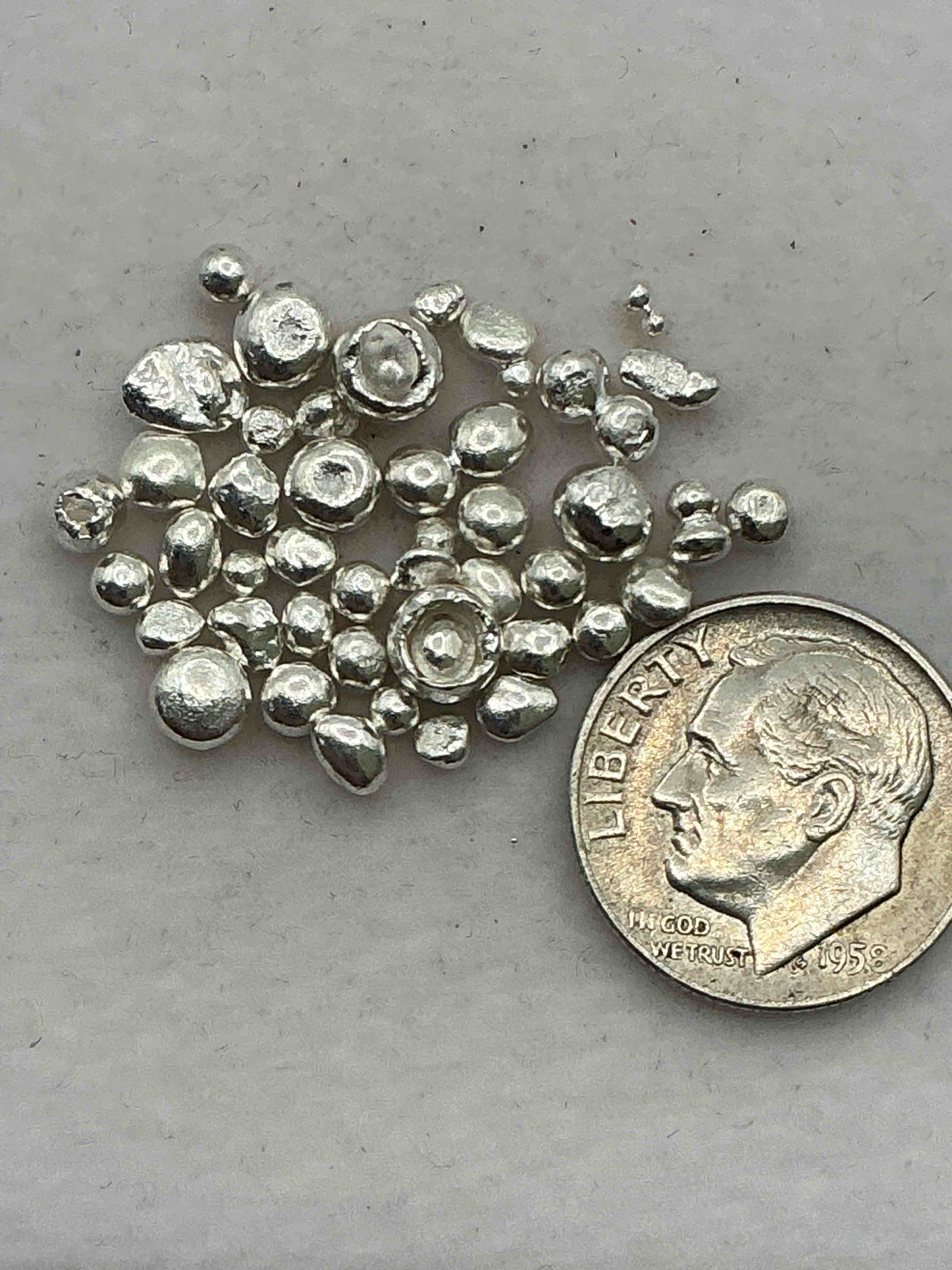 Condition photo showing New/Like New for Silver Nuggets! .999 US Fine Silver, In Small Nugget Form! Total Weight Of All Nuggets In Lot Approximately 6 Grams, Bid Is Per Nugget! A Cool Way To Invest In Fine US Silver! Includes Collector Capsule!