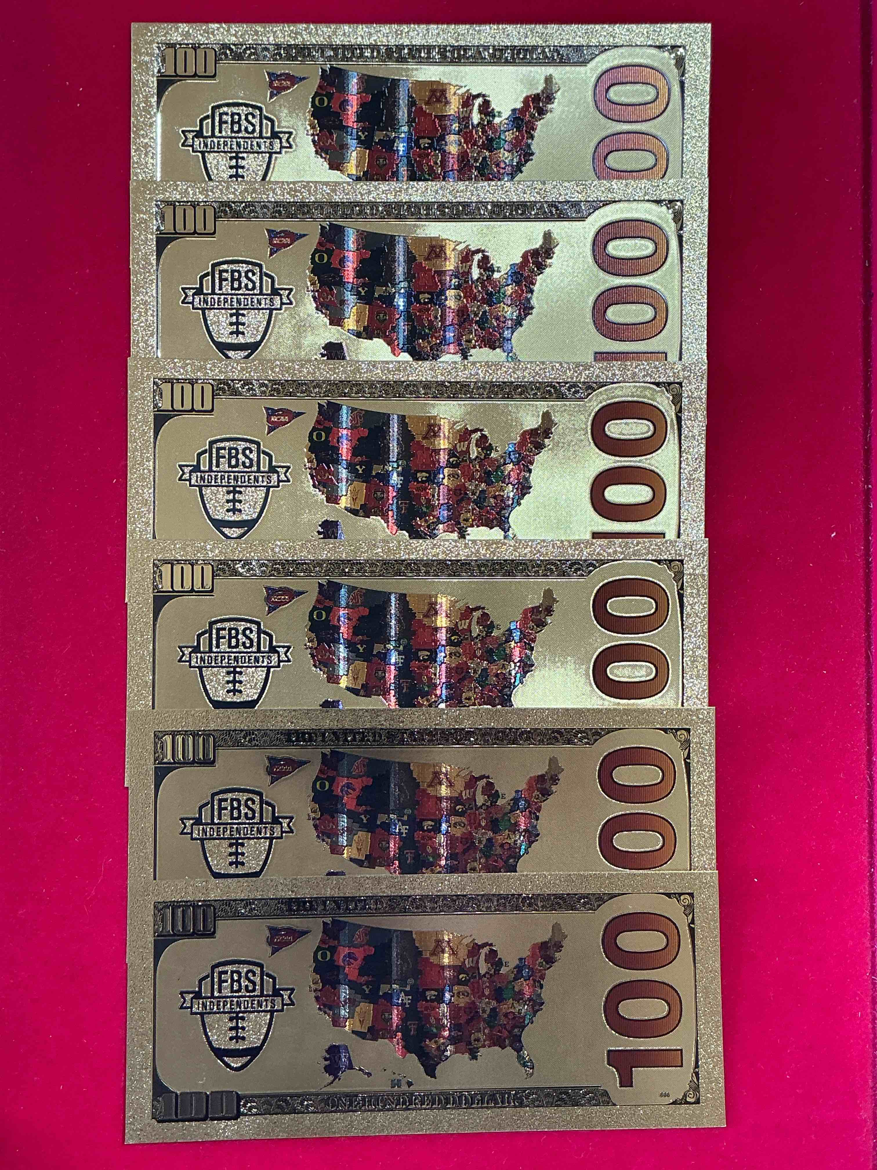 Condition photo showing New/Like New for Ohio State University Collectible Memorabilia! Super Cool, Gold In Color 100 Dollar Commemorative Ohio State University Bill! Cool Designs On Front & Back Of Bill! OSU Fans Rejoice, Cool Memorabilia! Plastic Bills With Cool Designs! 