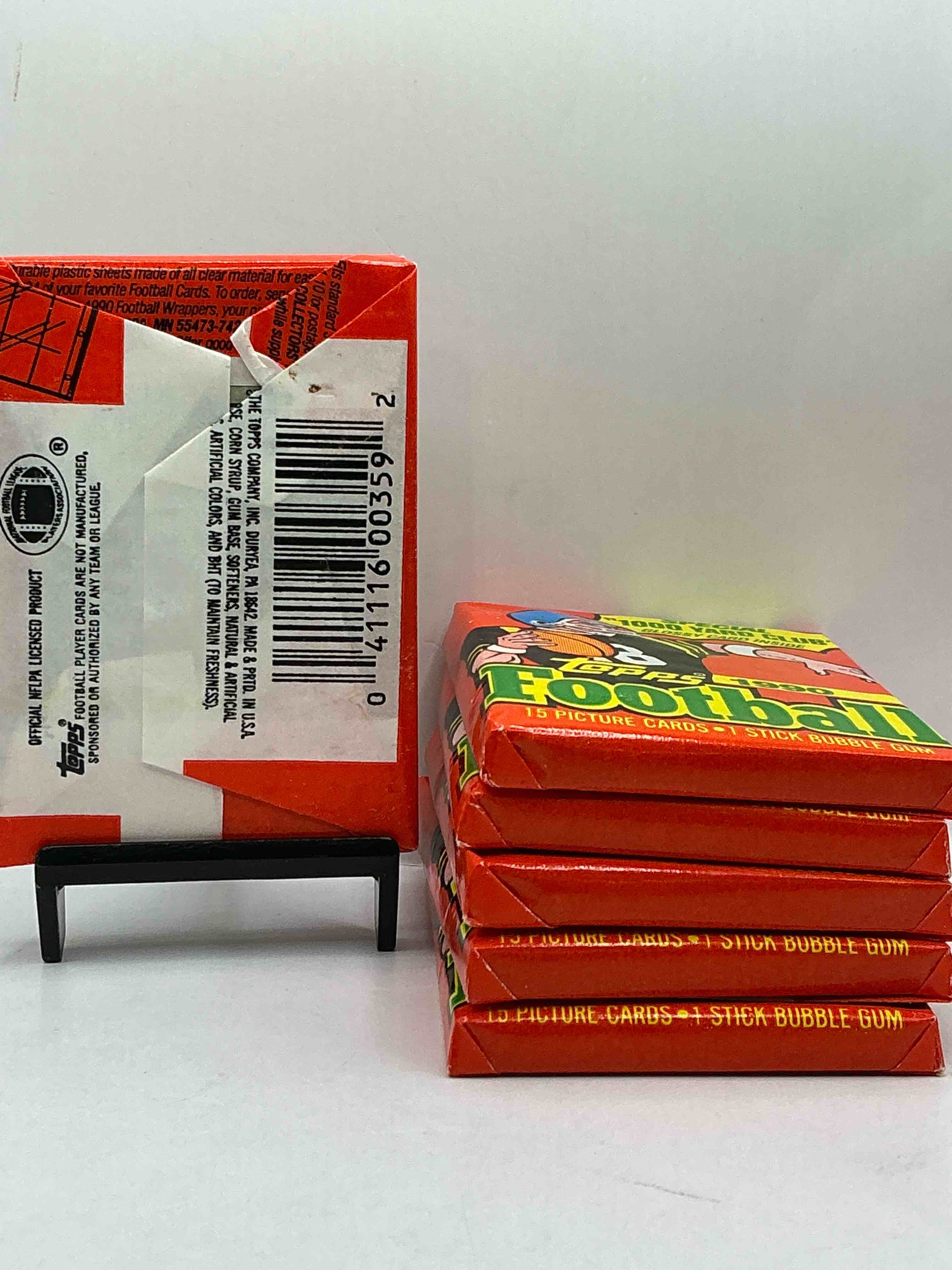 Condition photo showing New/Like New for The Last Year Of Football Wax! Joe Montana, Emmitt Smith & Barry Sanders!? 1990 Topps Football Unopened Sports Card Wax Pack, Direct From Original Retail Box! Getting Hard To Find! Search For Early Barry Sanders & Jerry Rice & So Much More!