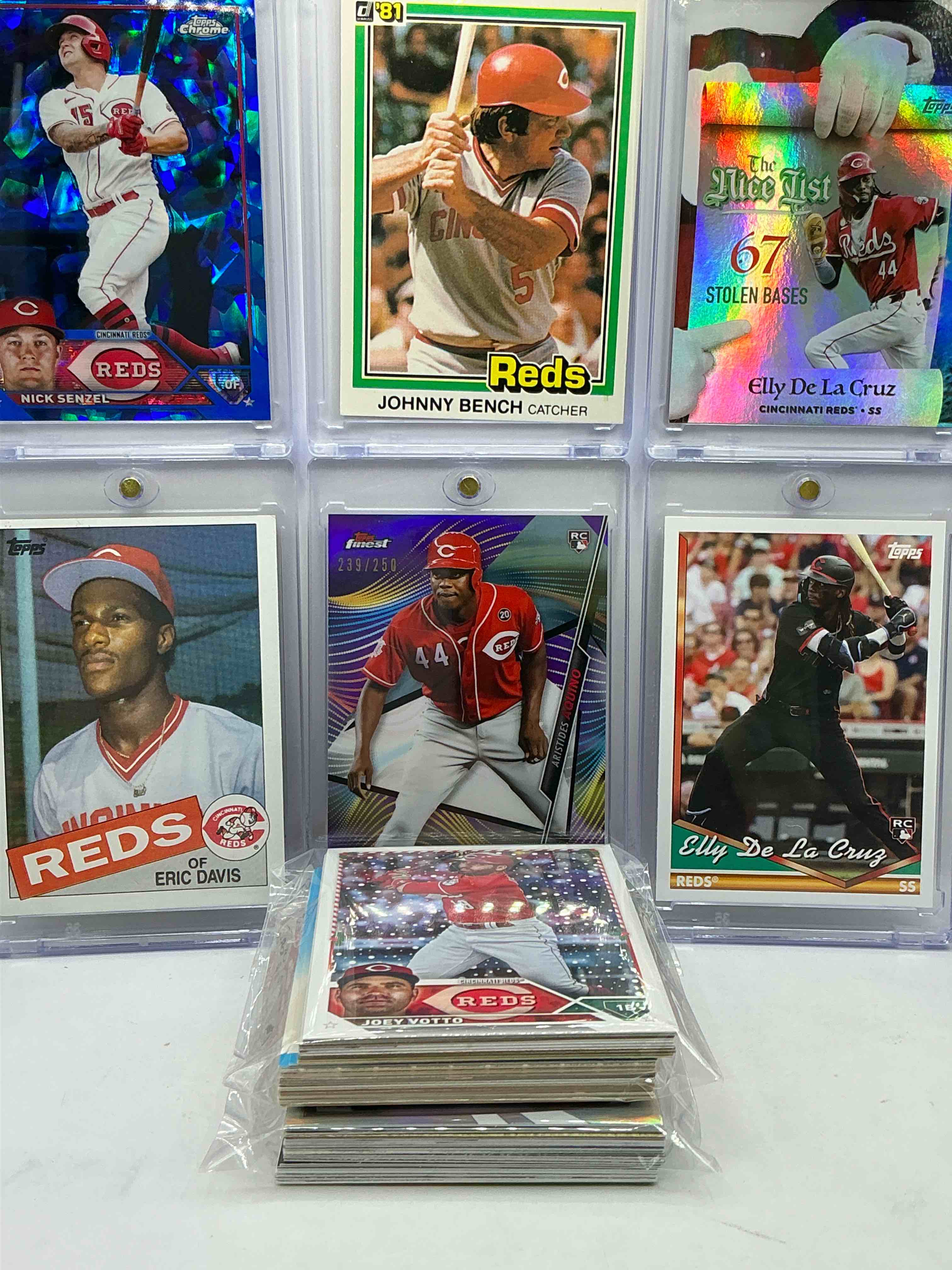 Condition photo showing New/Like New for Reds Rambunctiousness! Numbered Cards, Parallels, Rookies & More! Elly De La Cruz Rookies & More! Insane Trio! Cincy Reds WOW! Commons, Legends & More! Vintage & New! 