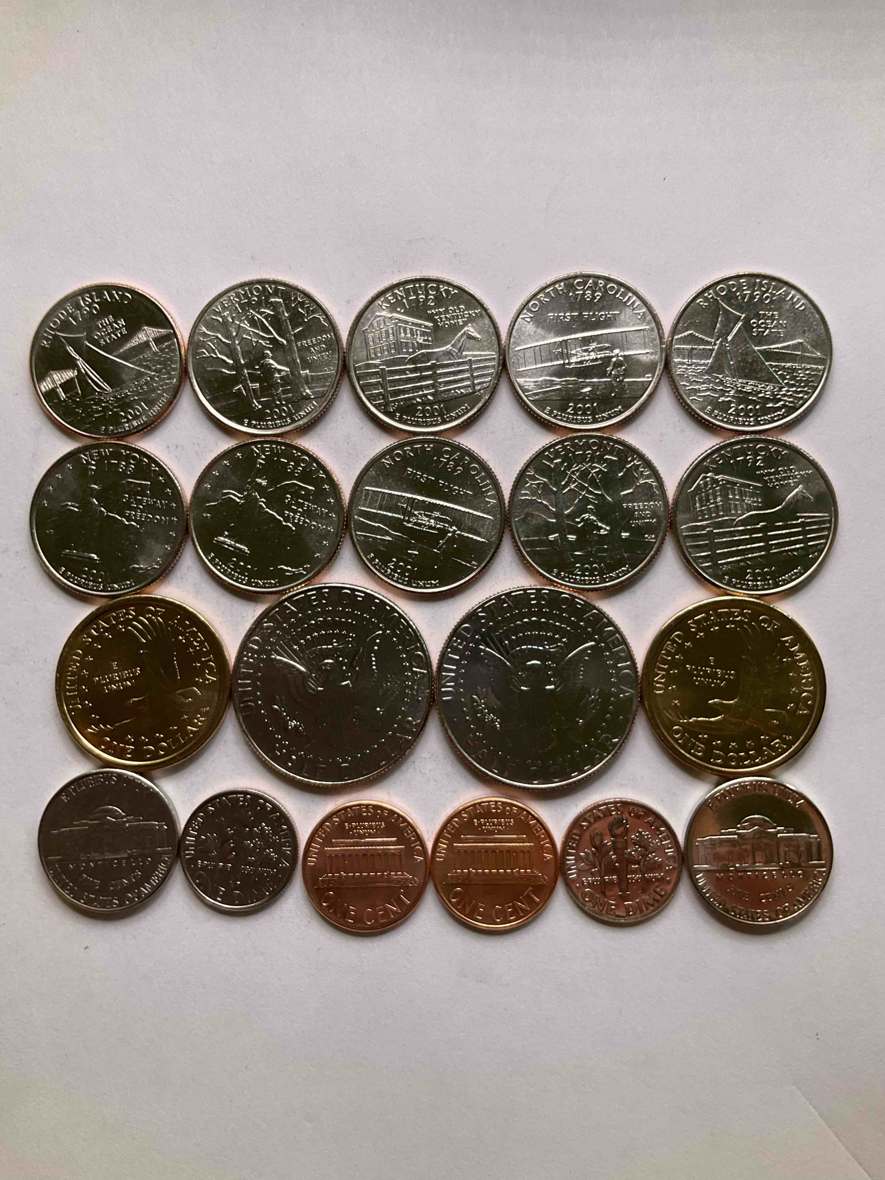 Condition photo showing New/Like New for 2001, The Year The World Changed Forever. Here Are Gorgeous 2001 U.S. Mint  Uncirculated Coins. Includes 20 Coins, Each Coin Minted That Year To Include The 10 State Quarters Issued That Year, Philadelphia & Denver Mints. Half Dollars, State Quarters, One Dollar Coins & More! Own An Incredible Collector Item & An Important Piece Of History.