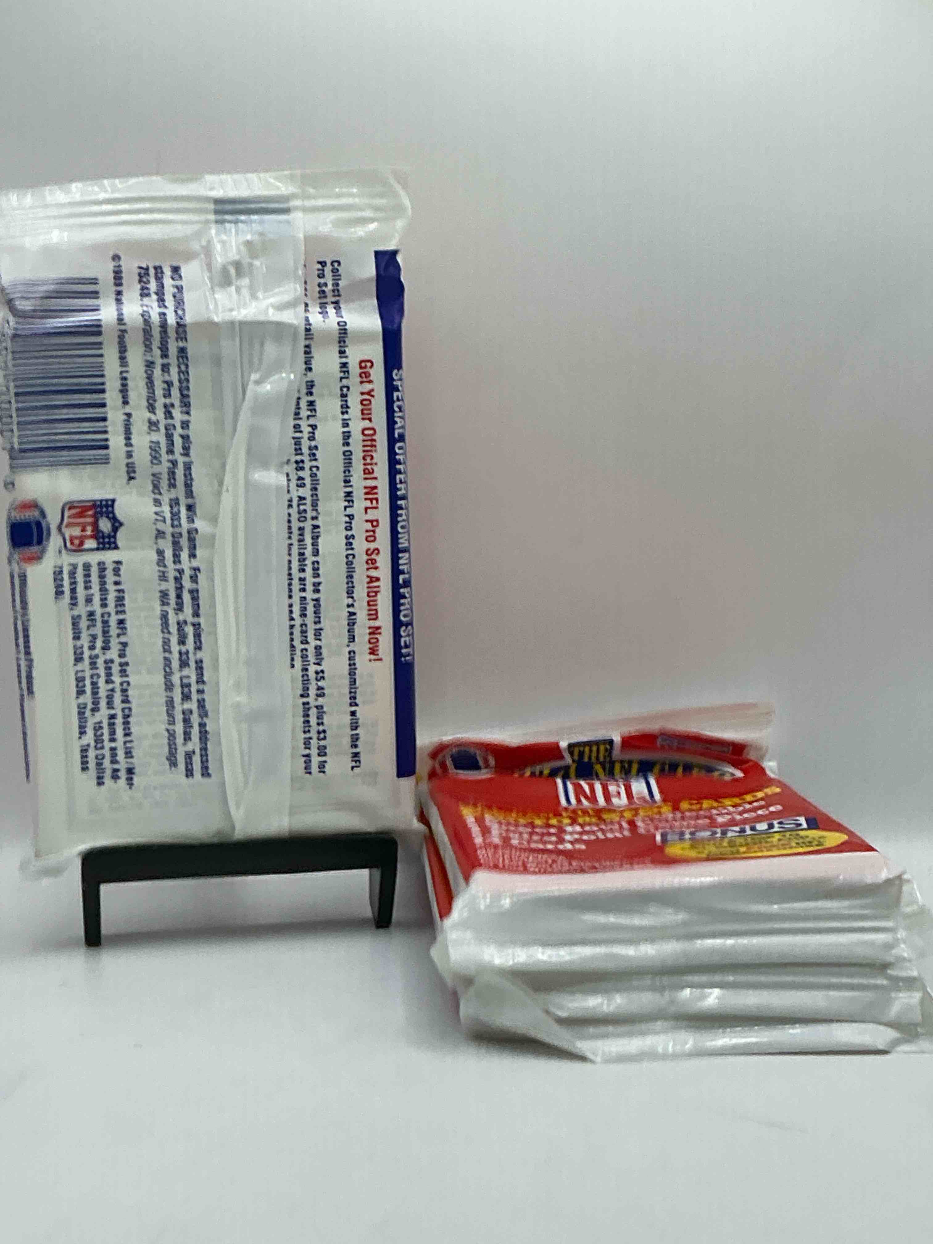 Condition photo showing New/Like New for Loaded! 1989 Pro Set Football Sealed Card Pack, Direct From Original Retail Case!Highly Sought After By Collectors As This Year Is Loaded With High Profile Rookies!Search For Rookie Cards From Barry Sanders, Deion Sanders, Troy Aikman, Michael Irvin & Much More! Getting Hard To Find!