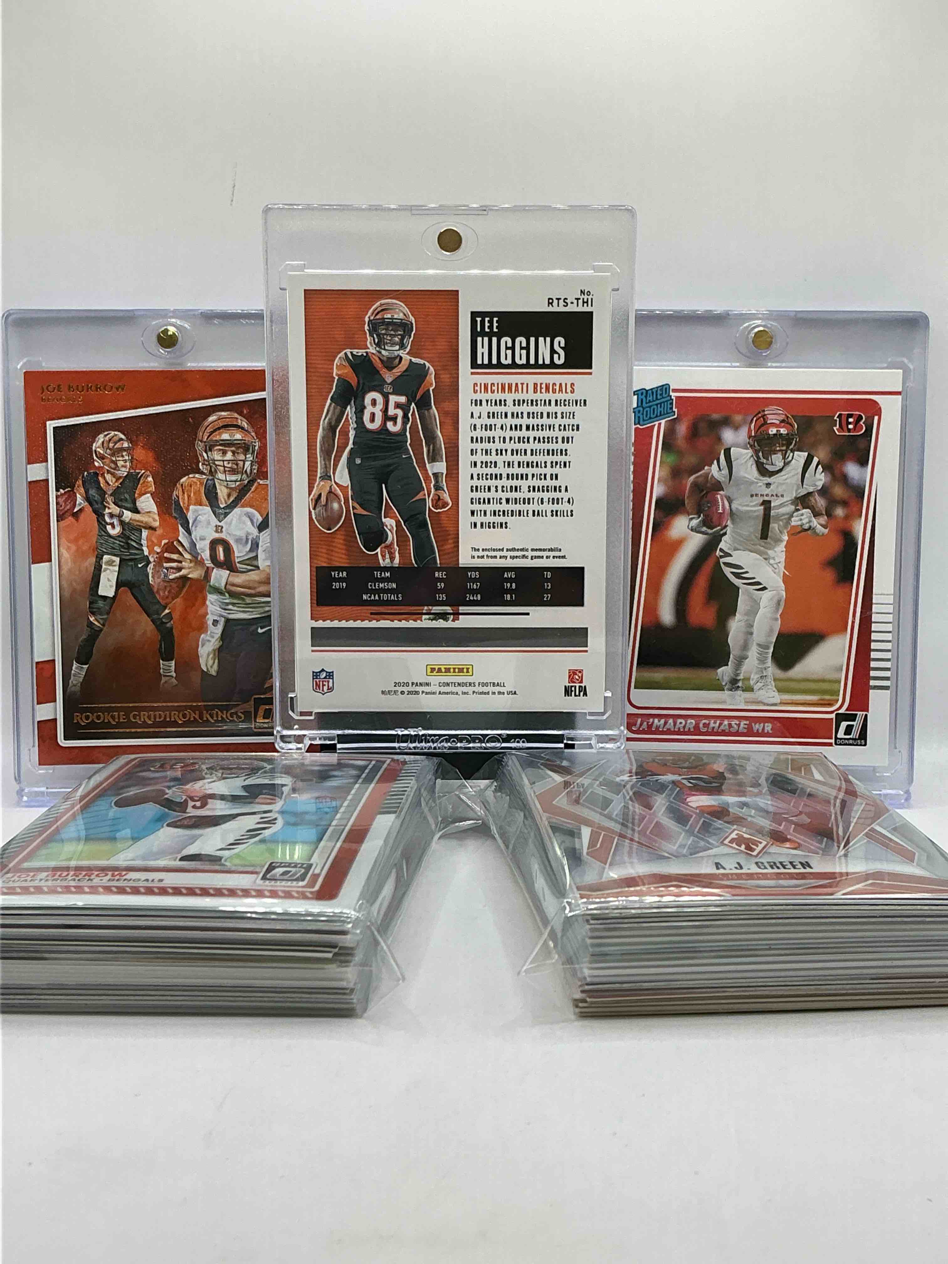 Condition photo showing New/Like New for Bengals Bonanza! Tee Higgins Rookie Jersey Card, Joe Burrow Rookie Gridiron Kings Card, Ja’marr Chase Rated Rookie Card & More! Cincinnati Fans Rejoice! This 50 Card Lot Includes Commons, Legends, Rookies & More! Mostly Modern! Wow!