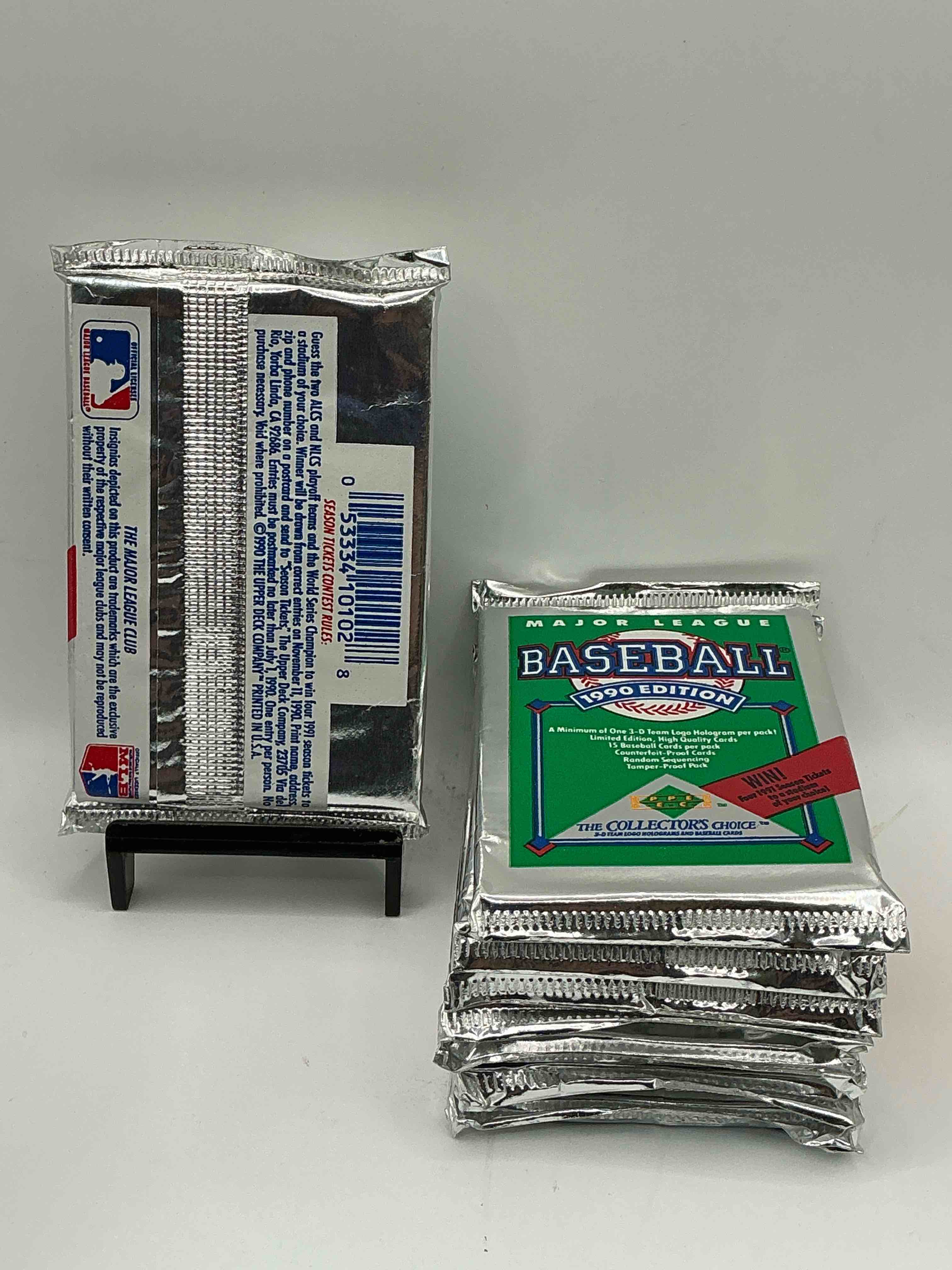 Condition photo showing New/Like New for 1990 Upper Deck Baseball Unopened Sports Trading Card Packs! Direct From Original Box! Look For Possible Collector's 3D Team Logo Card! As Well As Early Ken Griffey Jr. Cards!