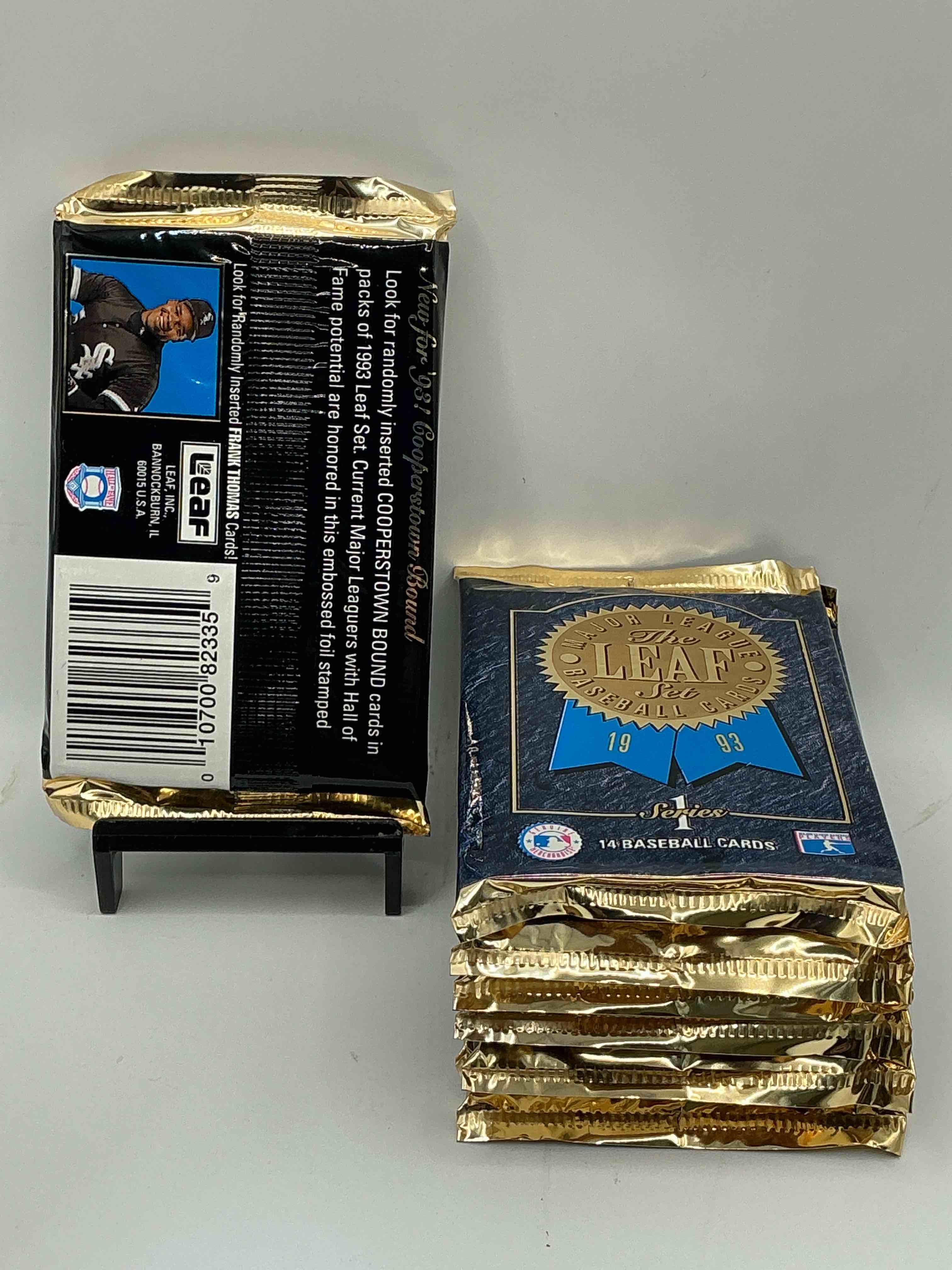 Condition photo showing New/Like New for 1993 Leaf Series 1 Baseball Sealed 14 Card Pack, Direct From Original Retail Display Case, Search For Derek Jeter, Ken Griffey Jr. & So Much Morel Search For Highly Collectible Inserts. These Cards Are Highly Sought After By Collectors For Their Holographic Design, These Are PREMIUM Baseball Cards From 1993!