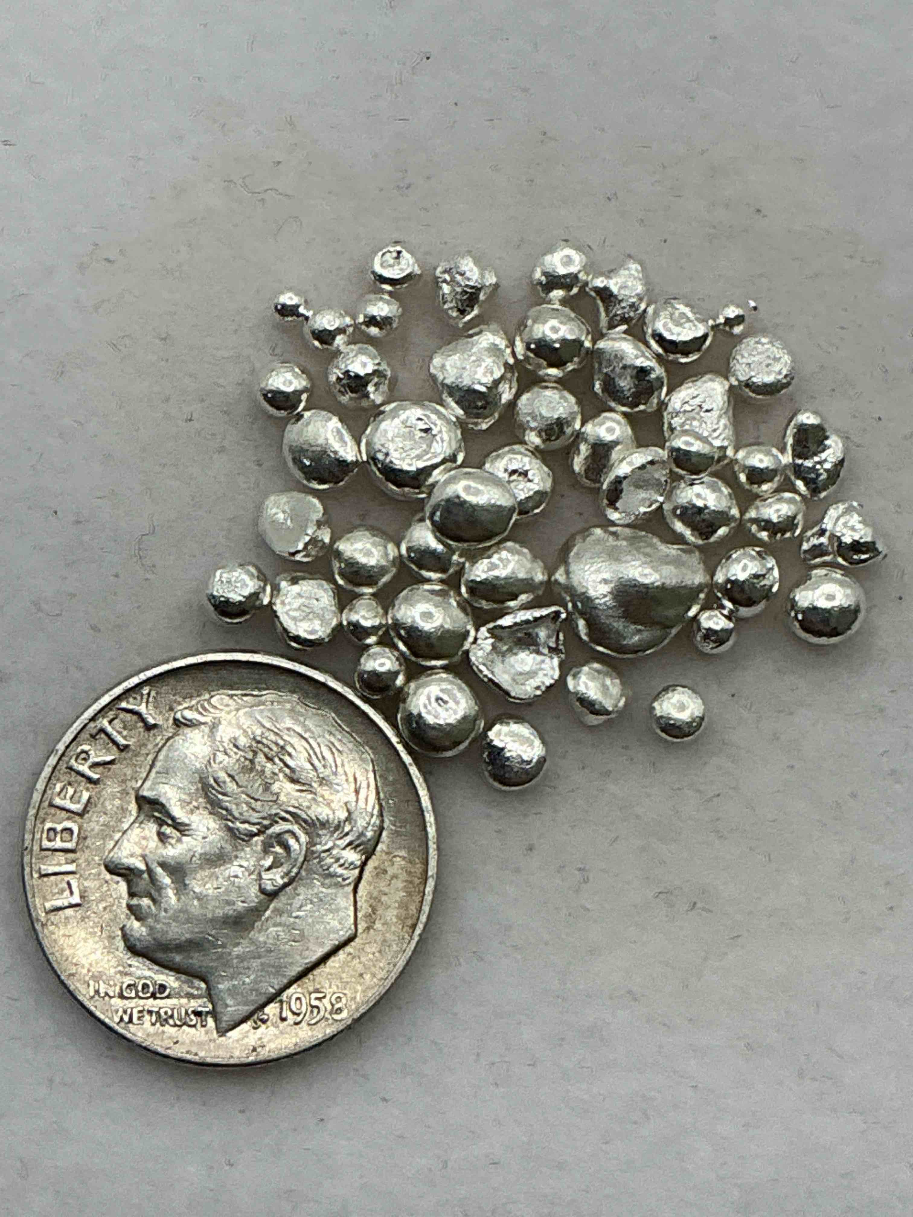 Condition photo showing New/Like New for Silver Nuggets! .999 US Fine Silver, In Small Nugget Form! Total Weight Of All Nuggets In Lot Approximately 6 Grams, Bid Is Per Nugget! A Cool Way To Invest In Fine US Silver! Includes Collector Capsule!