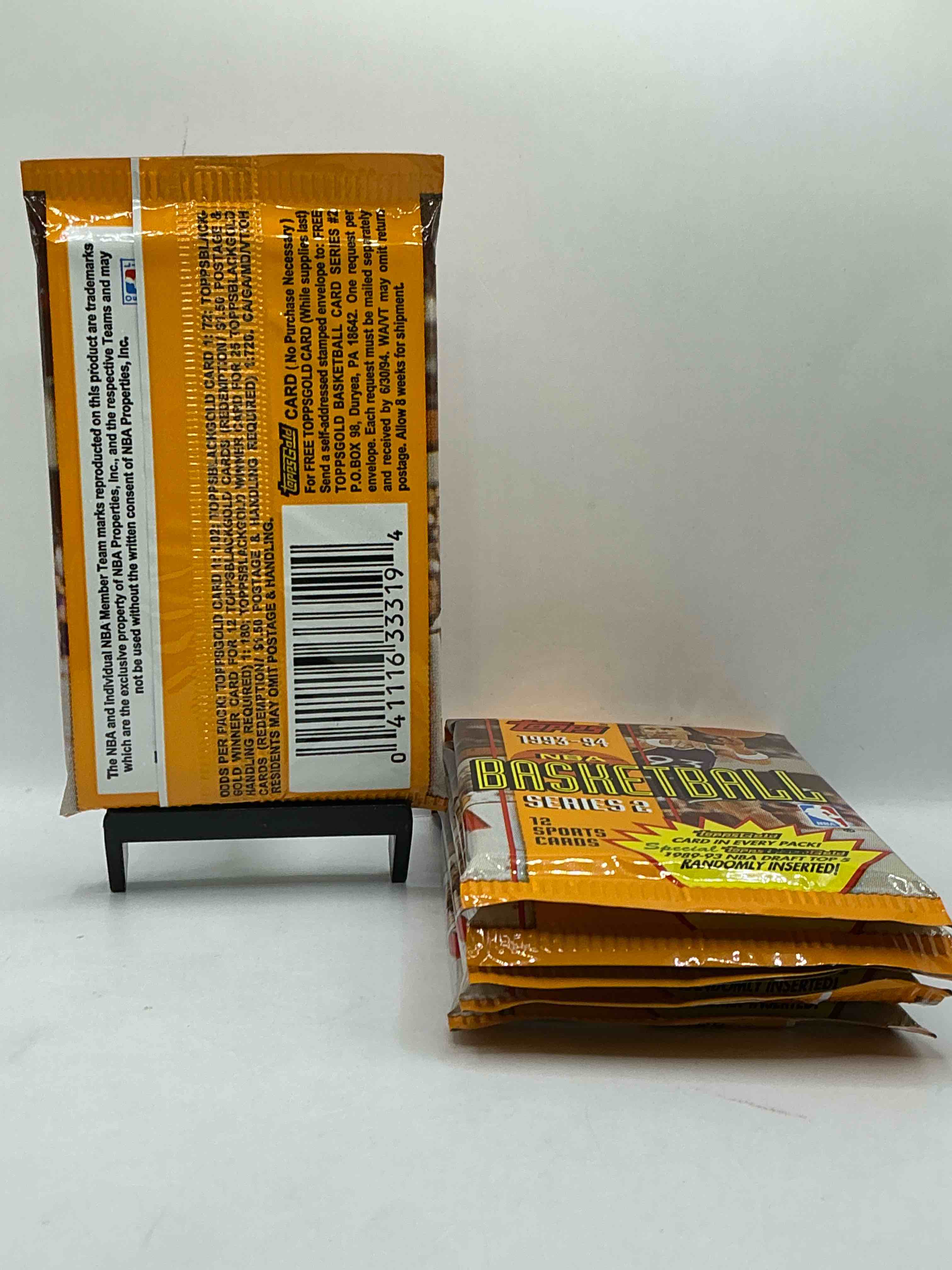 Condition photo showing New/Like New for NBA Bonanza! 1993- 94 Topps Basketball Packs! 12 Premium Basketball Cards In Each Pack! Search For Legends & Rookies Alike! Look For Michael Jordan, Shag O'Nell, Hakeem Olajuwon & More Ist Day Issue Cards, Frequent Flyer Cards, Members Only Cards & Rookies From Hardaway & Webber! Possible Pippen, Magic, Jordan, Robinson, Shaq, Olajuwon, Ewing & So Much More!
