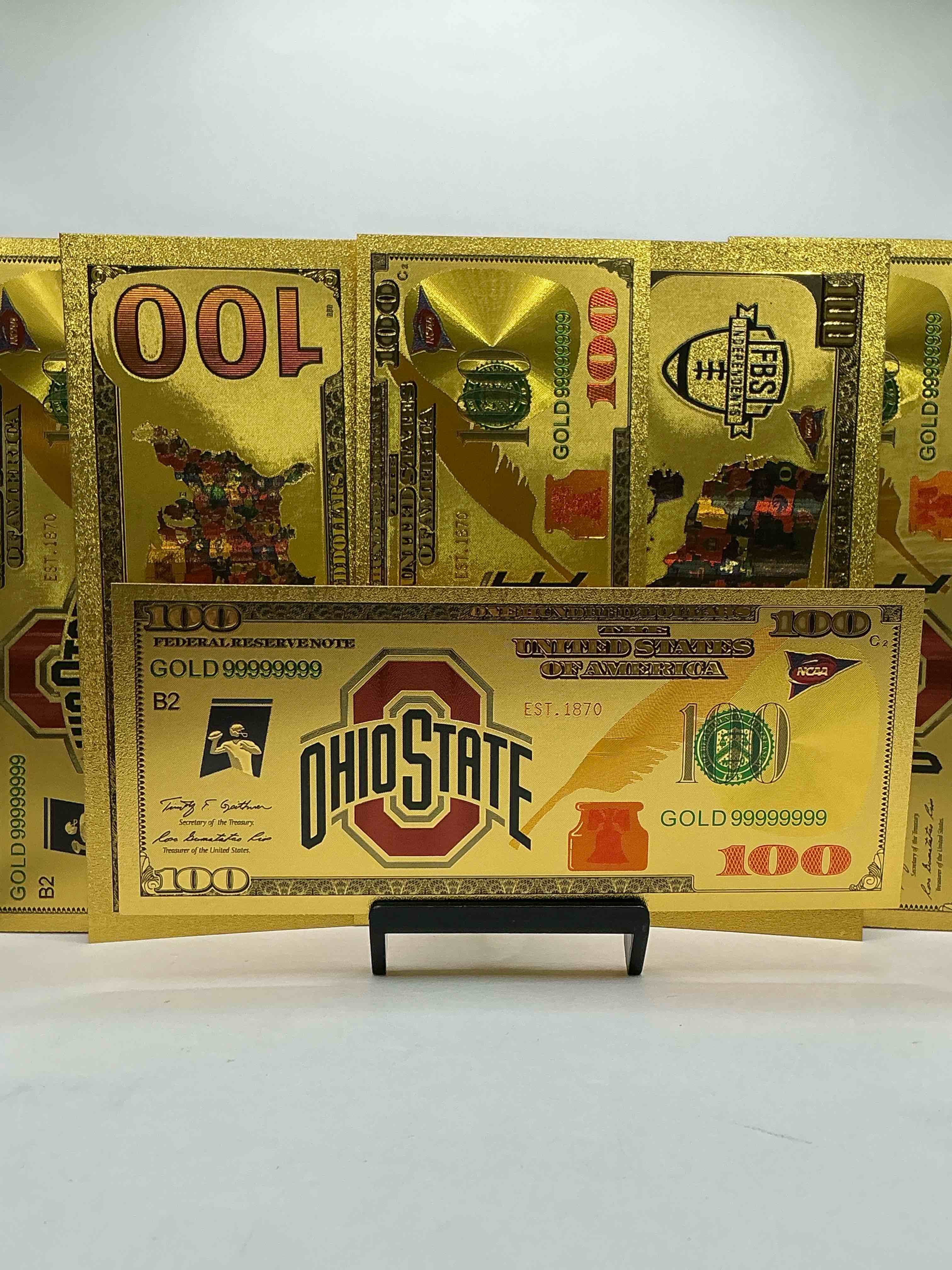 Condition photo showing New/Like New for Ohio State University Collectible Memorabilia! Super Cool, Gold In Color 100 Dollar Commemorative Ohio State University Bill! Cool Designs On Front & Back Of Bill! OSU Fans Rejoice, Cool Memorabilia! Plastic Bills With Cool Designs! 