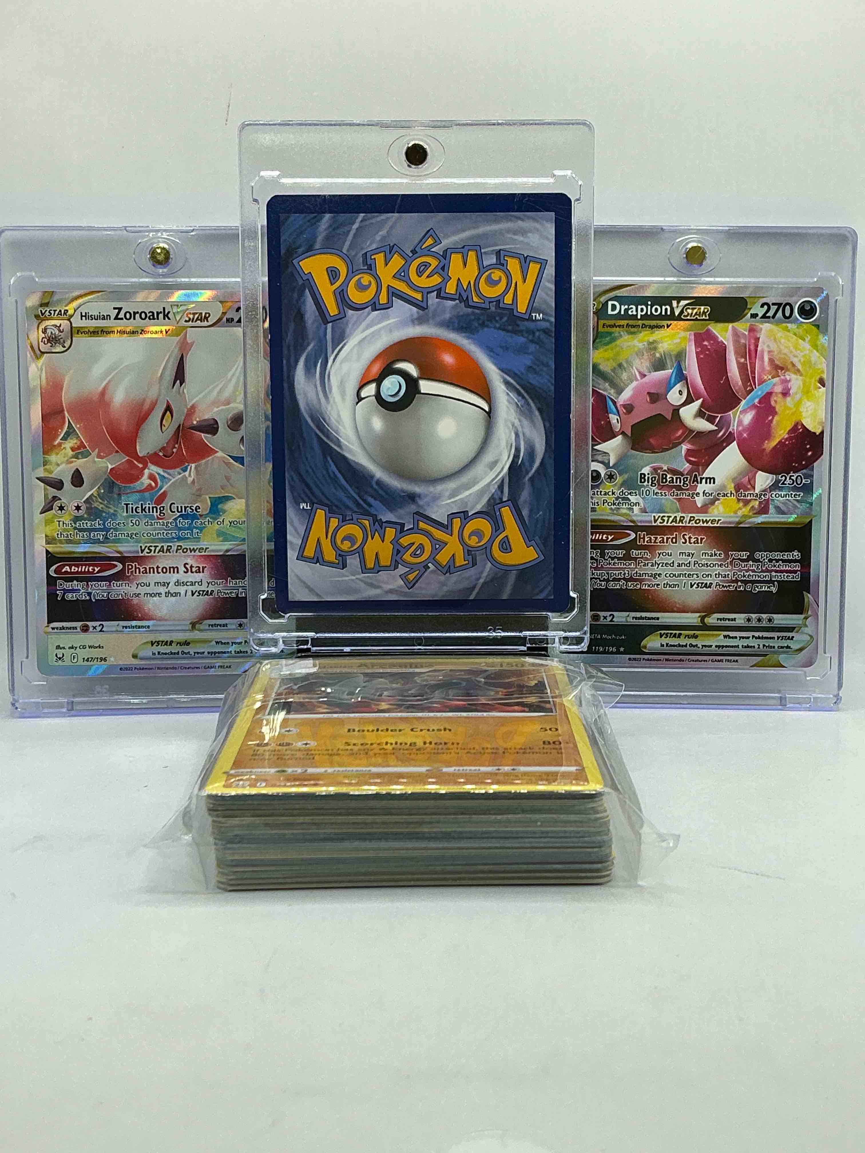 Condition photo showing New/Like New for Charizard GX Holo, Zoroark VSTAR, Drapion VSTAR & More! Insane Trio! This 50 Card Lot Includes Commons, Legends, Heroes, Holos & More! Pokémon Palooza!