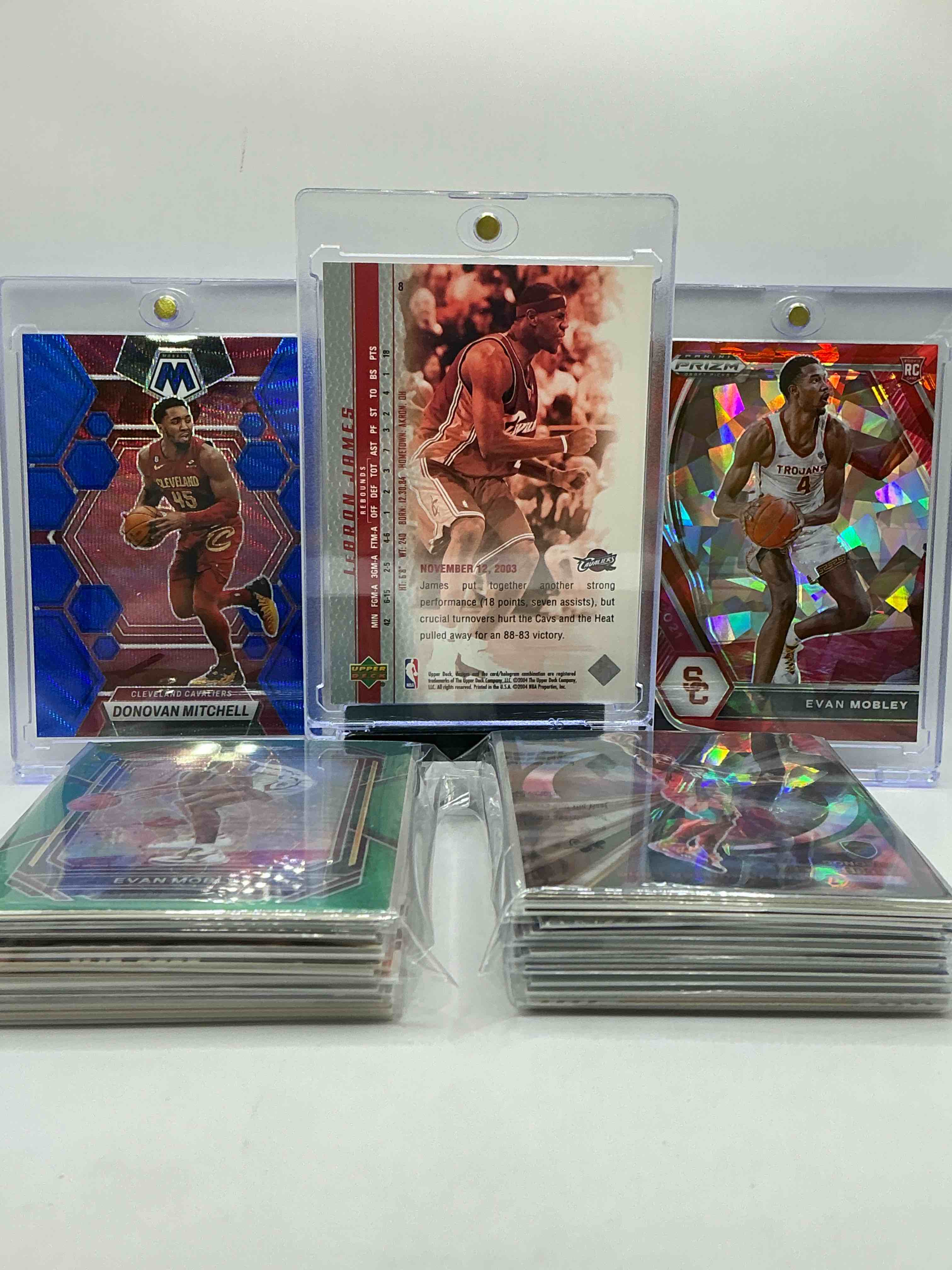 Condition photo showing New/Like New for LeBron James Upper Deck Rookie Card, Donovan Mitchell Blue Mosaic, Evan Mobley Cracked Ice Prizm Rookie & More! Insane Trio! Cavaliers Craziness! This 50 Card Craziness Includes Commons, Legends & More! WOW! Modern Cavs!